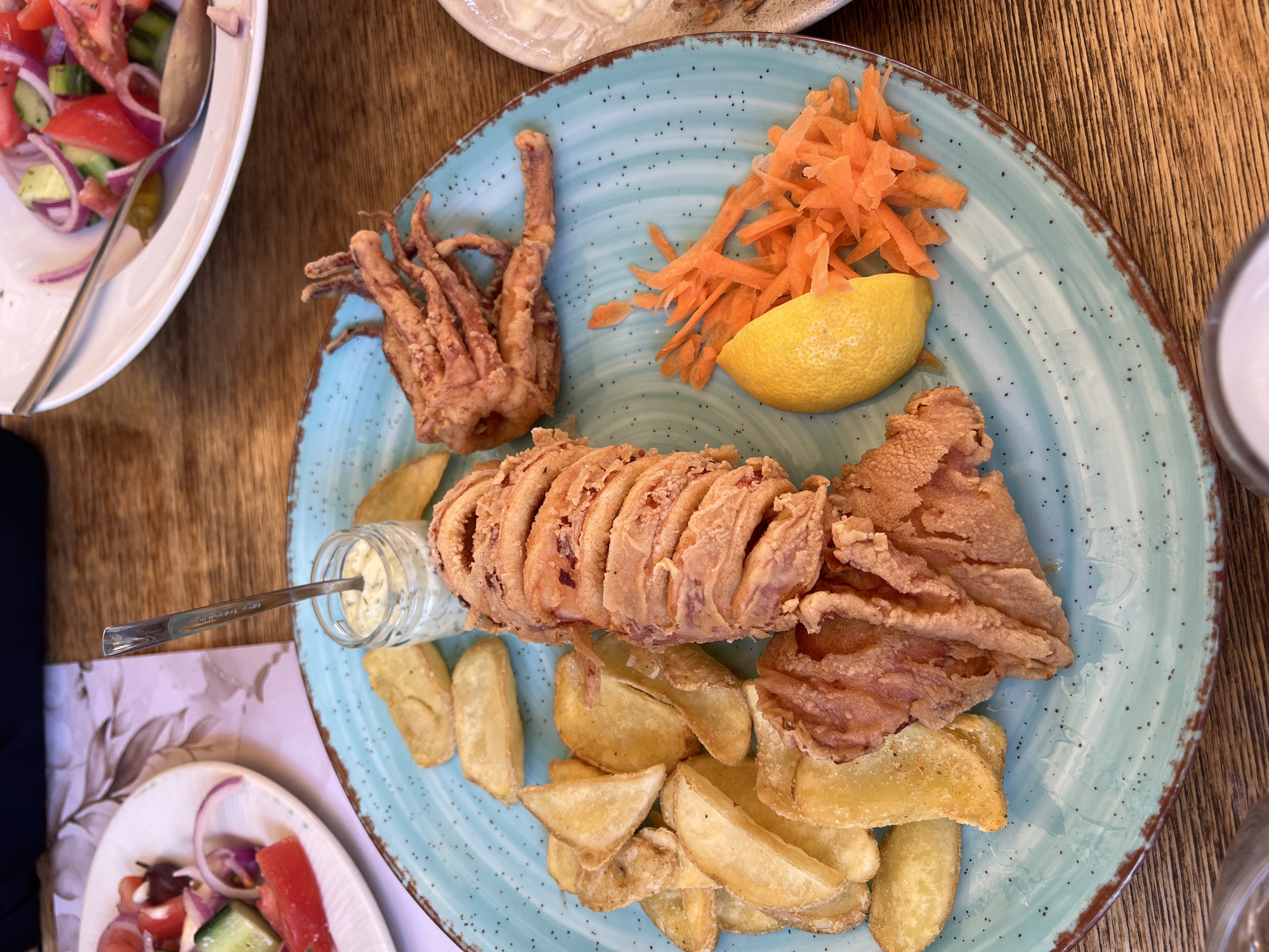 Seafood meal and wine collection documented in Xanthi, Greece