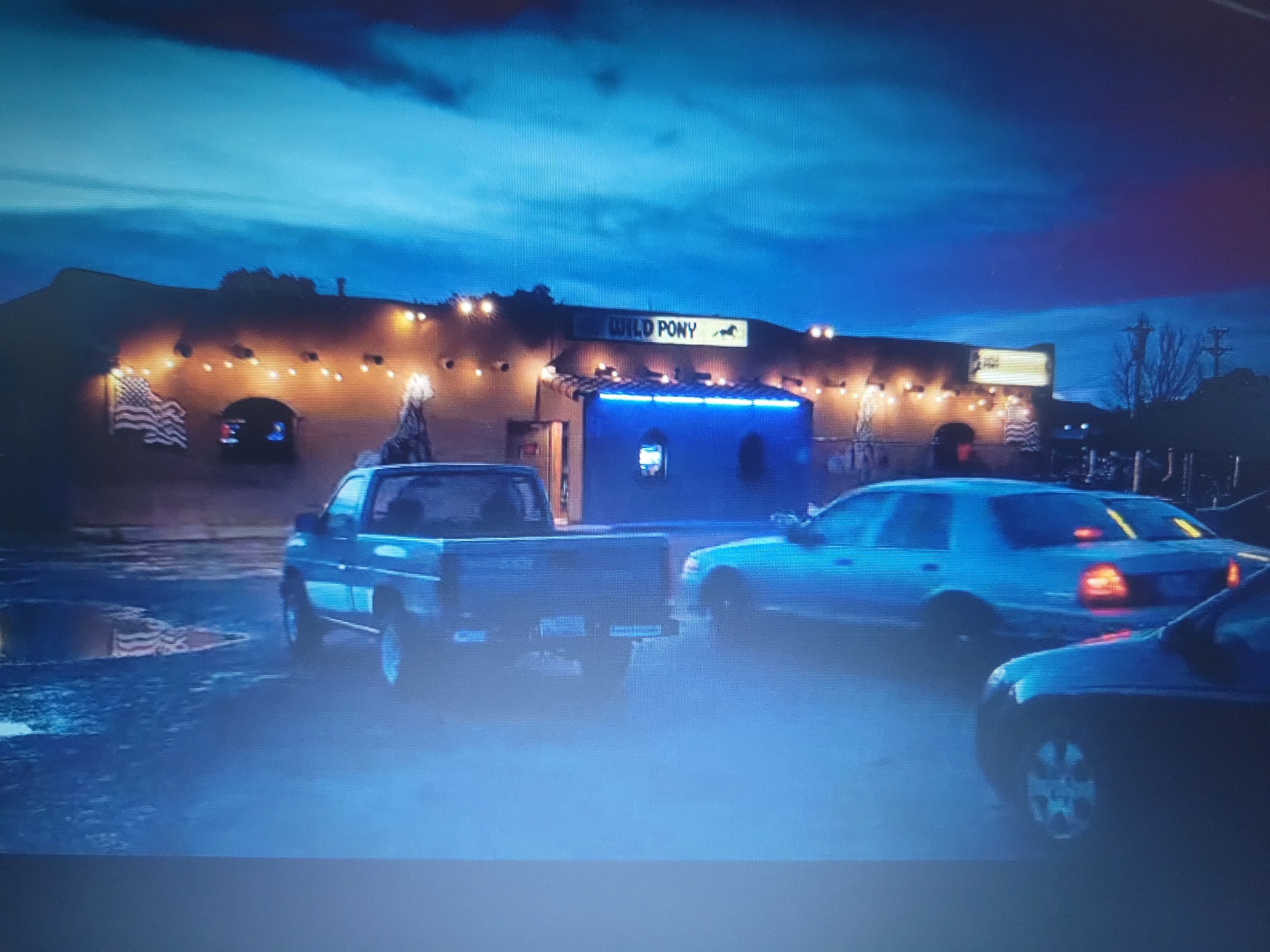 Bar exterior and laptop detail spotted in Ogbomosho, Nigeria