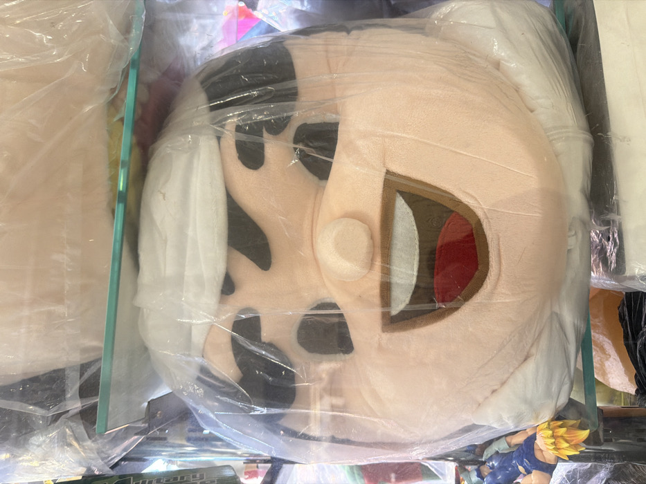 Cartoon character plush toy displayed in Dubai storefront