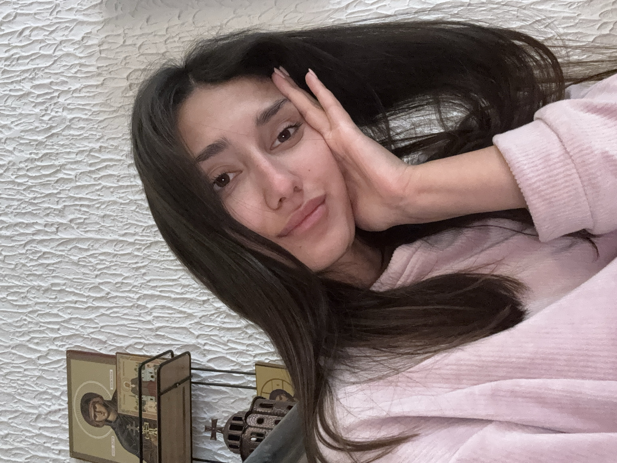 Woman Takes Selfie in Pink Sweater in Sutomore