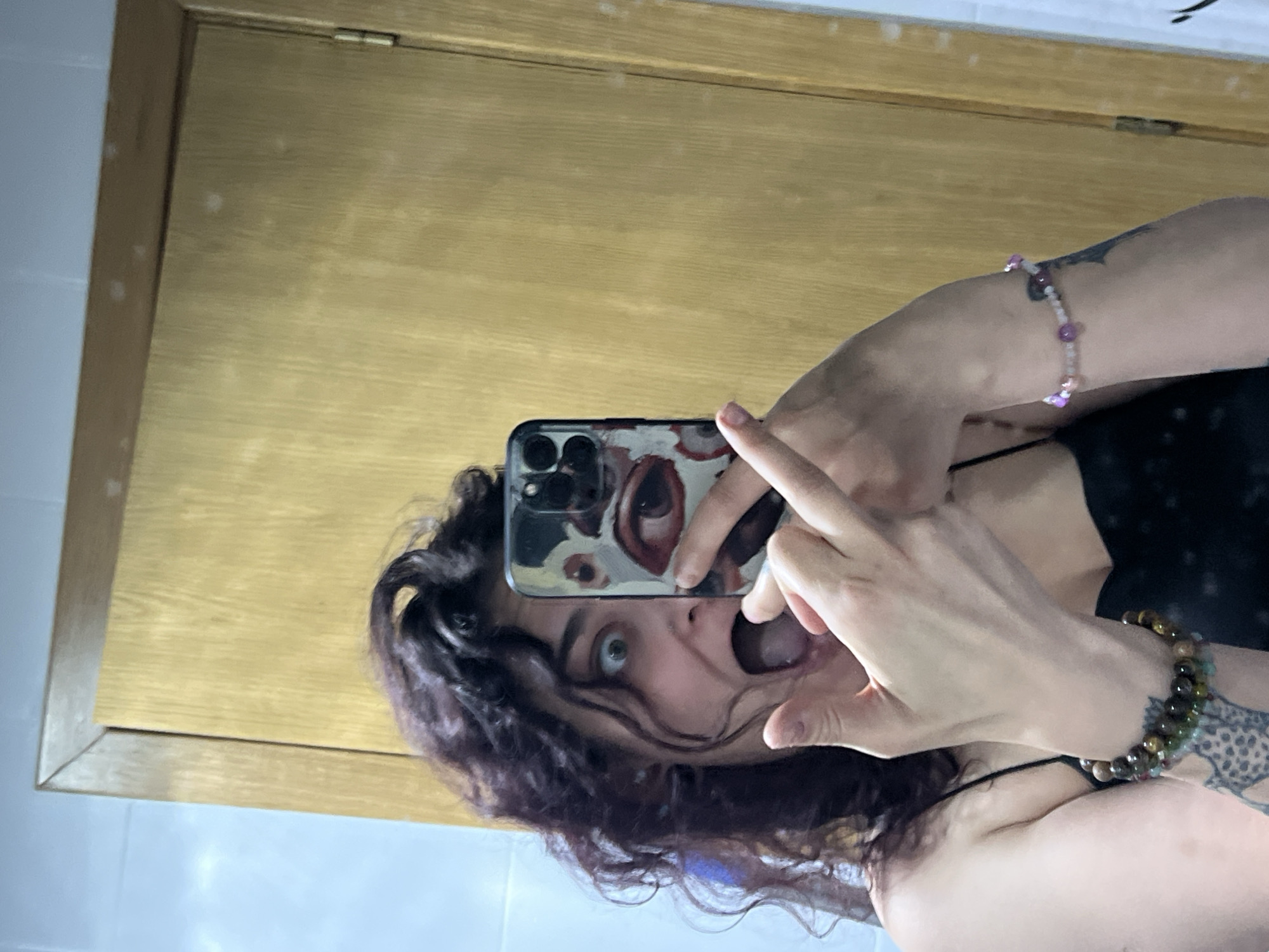Woman takes bathroom selfies in Picassent, Spain