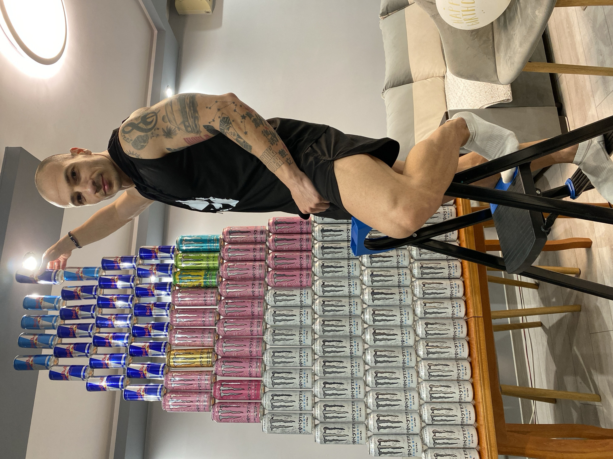 Man builds energy drink pyramid display in Pleven