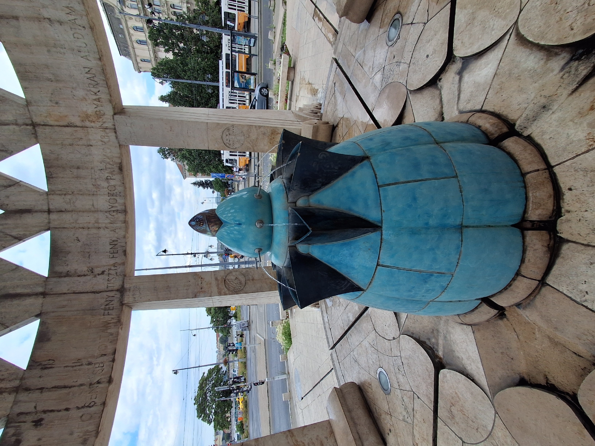 Teal crowned fountain flows in Budapest