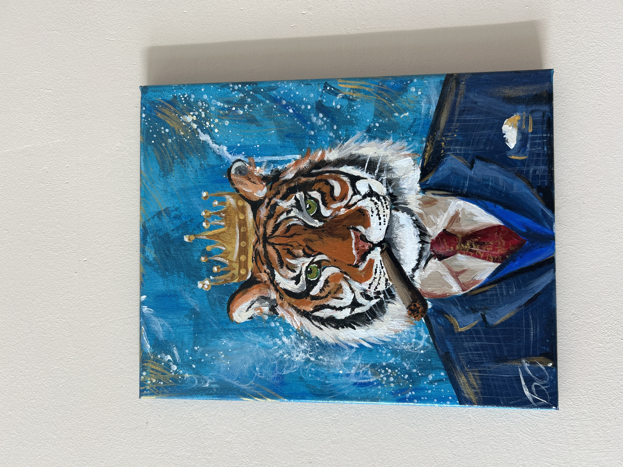 Acrylic painting shows crowned tiger in business suit spotted