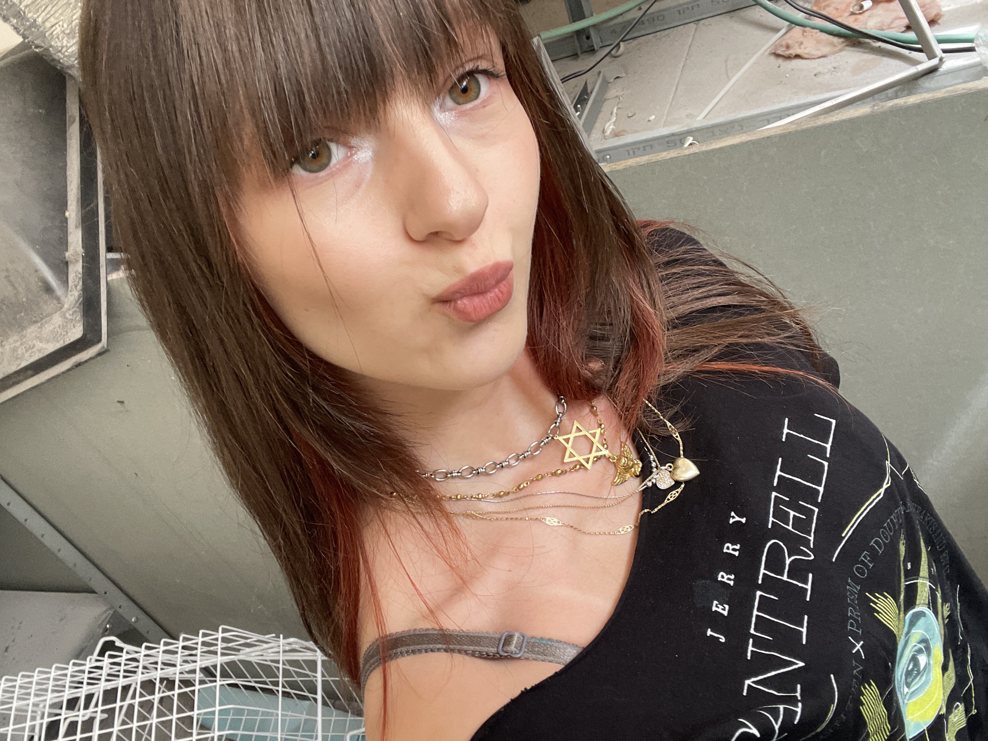Woman takes selfies wearing Jerry Cantrell shirt in Raanana