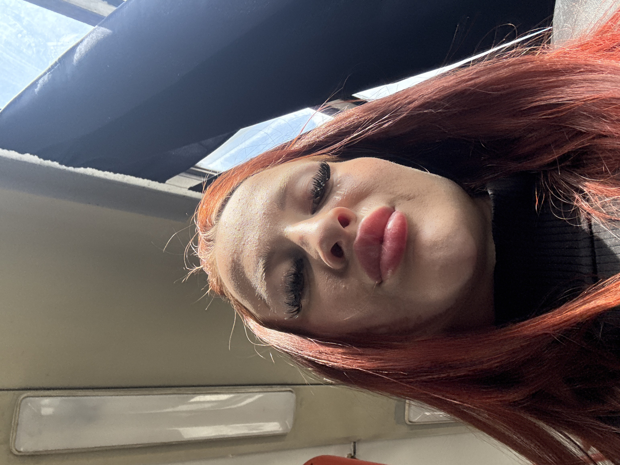 Woman takes selfie inside vehicle in Simferopol