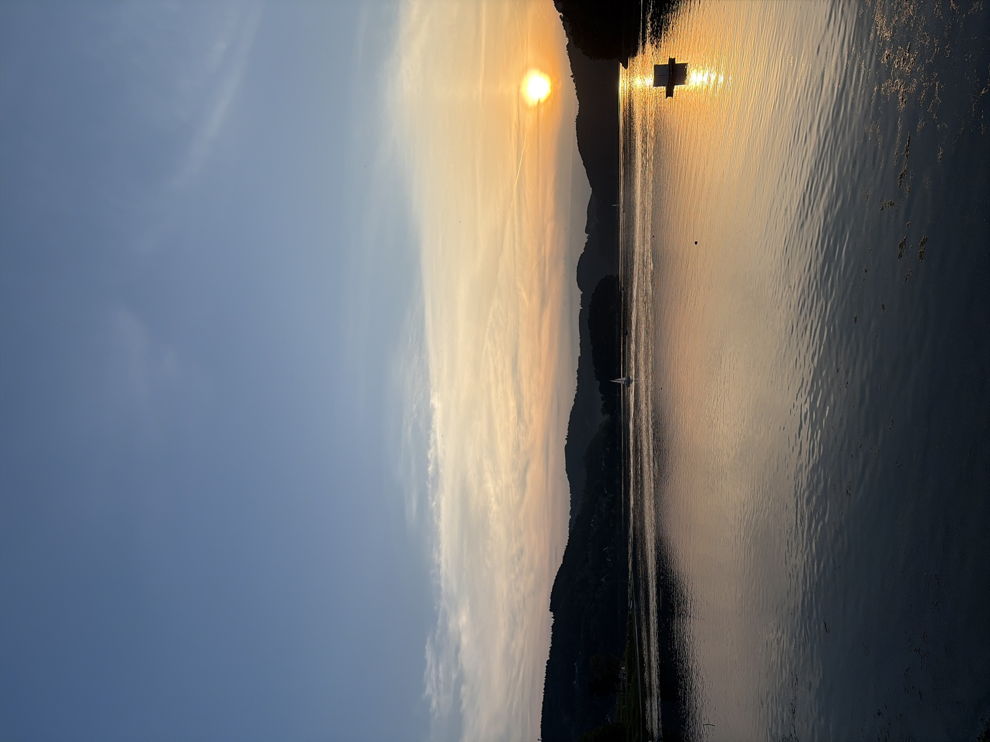 Hot air balloons and a vivid sunset over Lake Rożnowskie