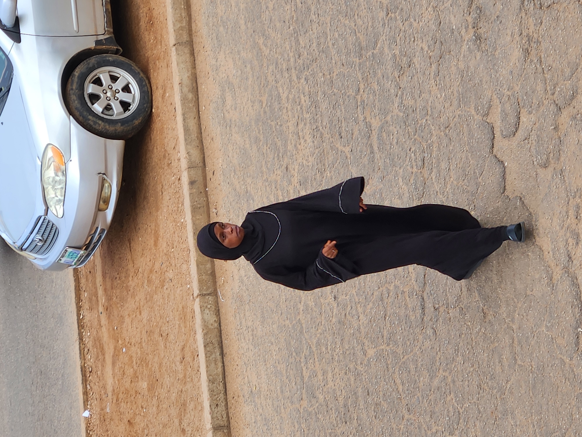 Urban street activity documented amid military presence