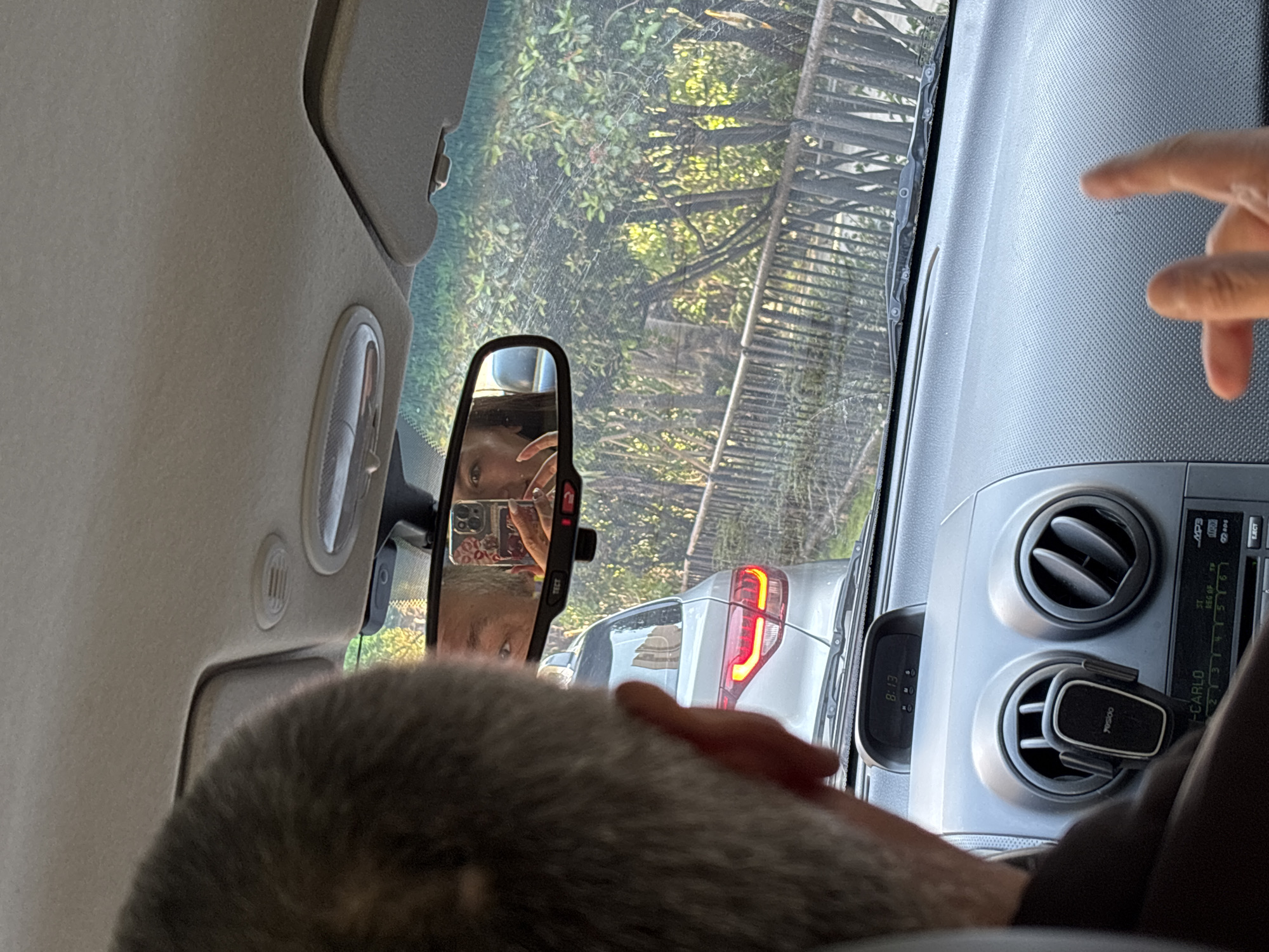 Mother and baby travel through Sochi during morning outing