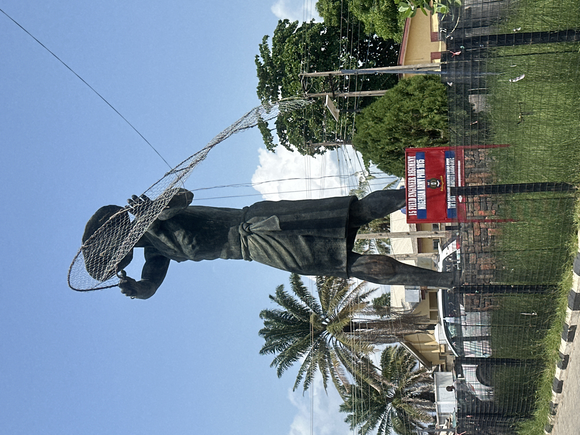 Bronze fisherman statue documented by witnesses in Badagry, Nigeria