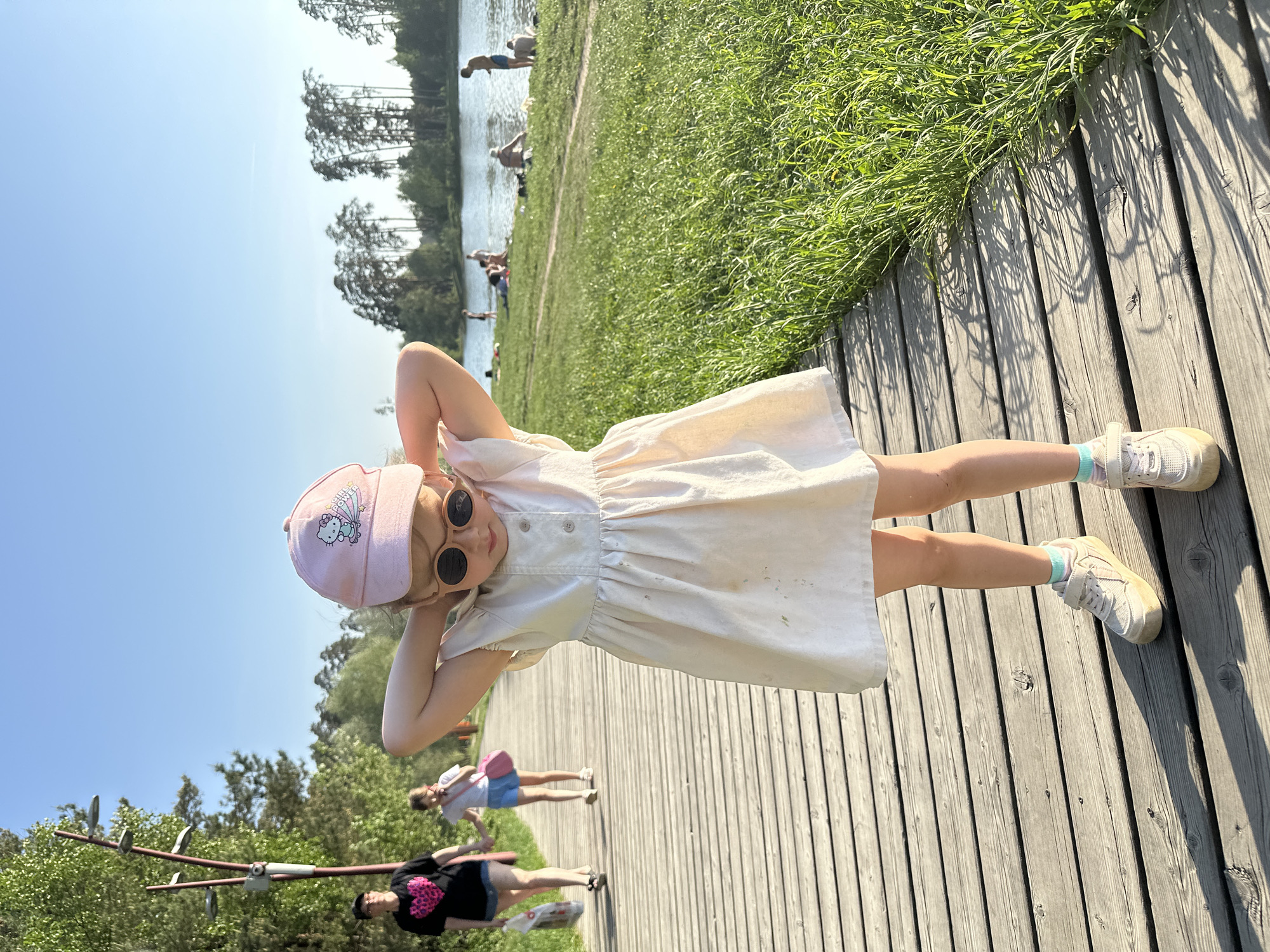 Children play on wooden boardwalk in Kazan