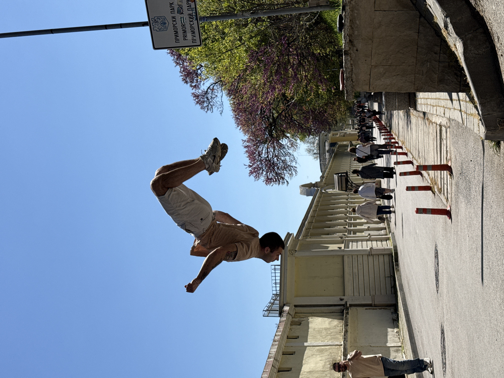 Man performs backflips in public space in Varna