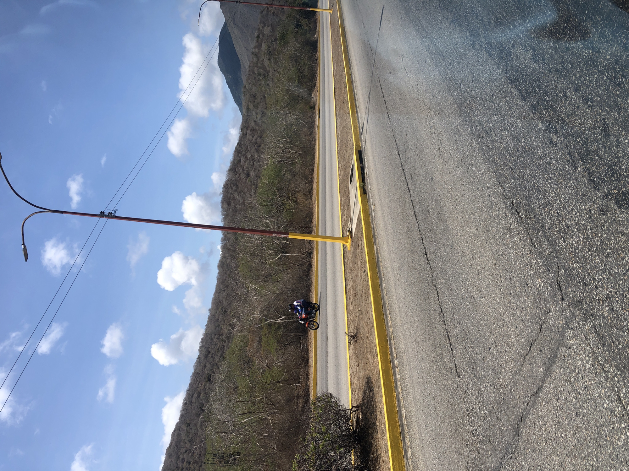Motorcycle rides median strip on La Asuncion road
