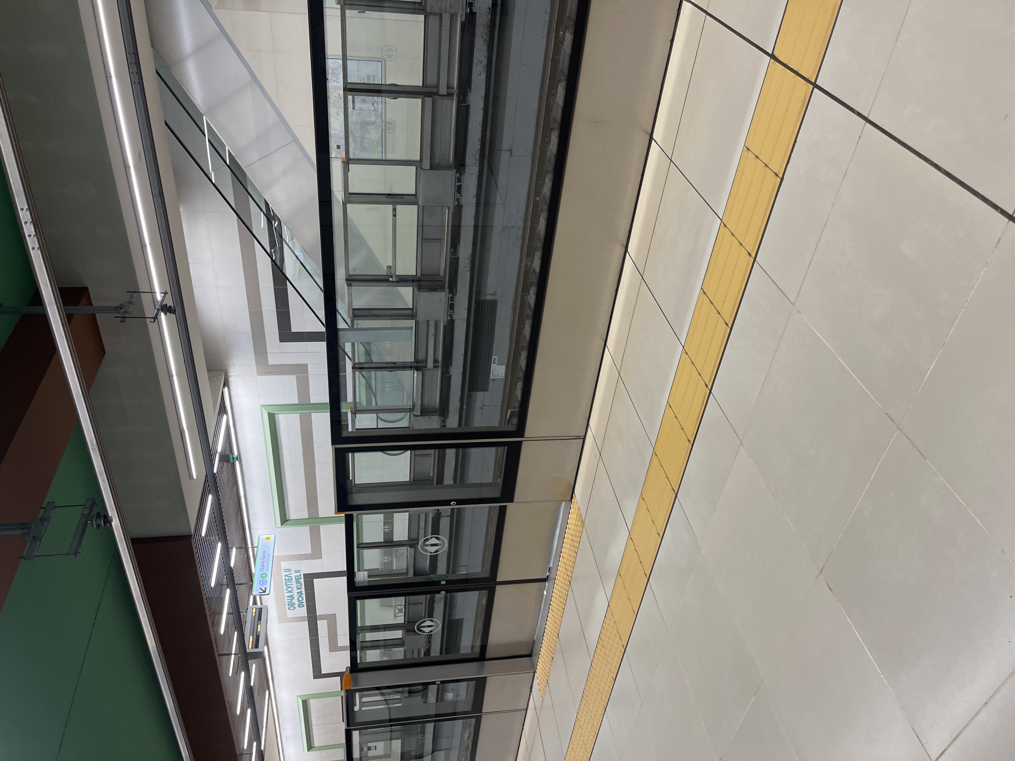 Morning observations capture Sofia subway platform and Bitcoin trading workspace