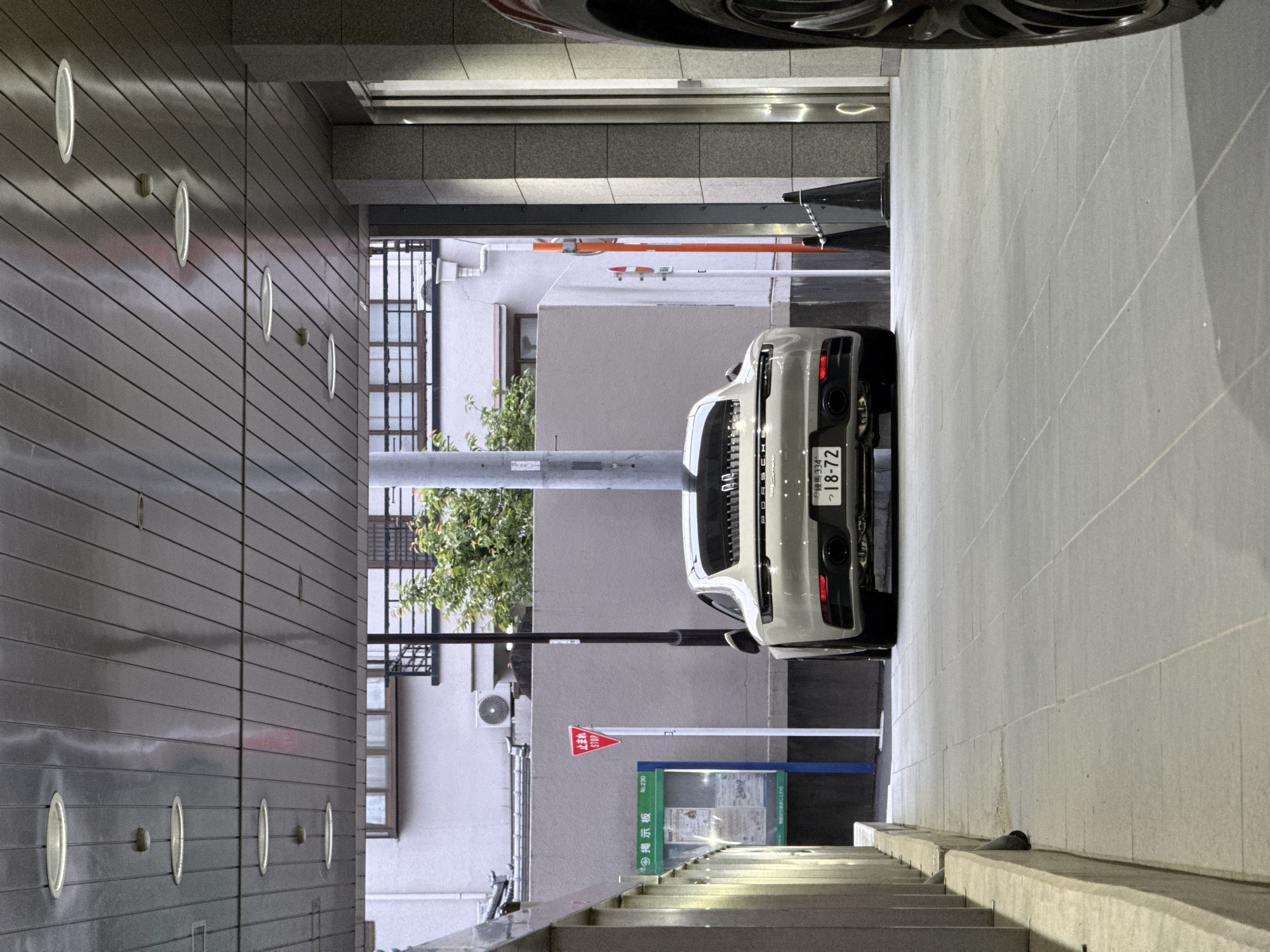 Morning visit to Porsche dealership in Tokyo captures luxury cars