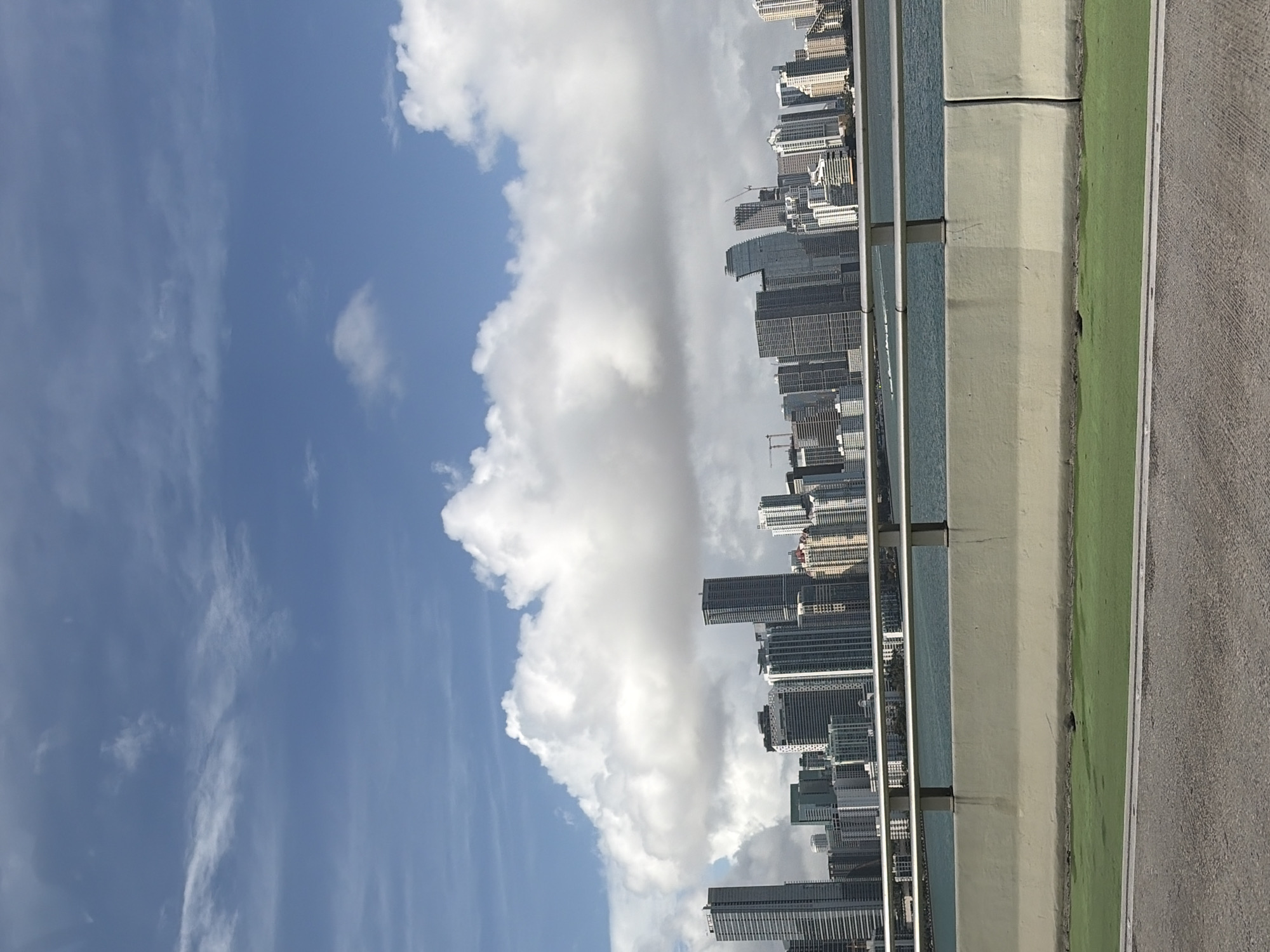 Miami skyline viewed from bridge on March evening