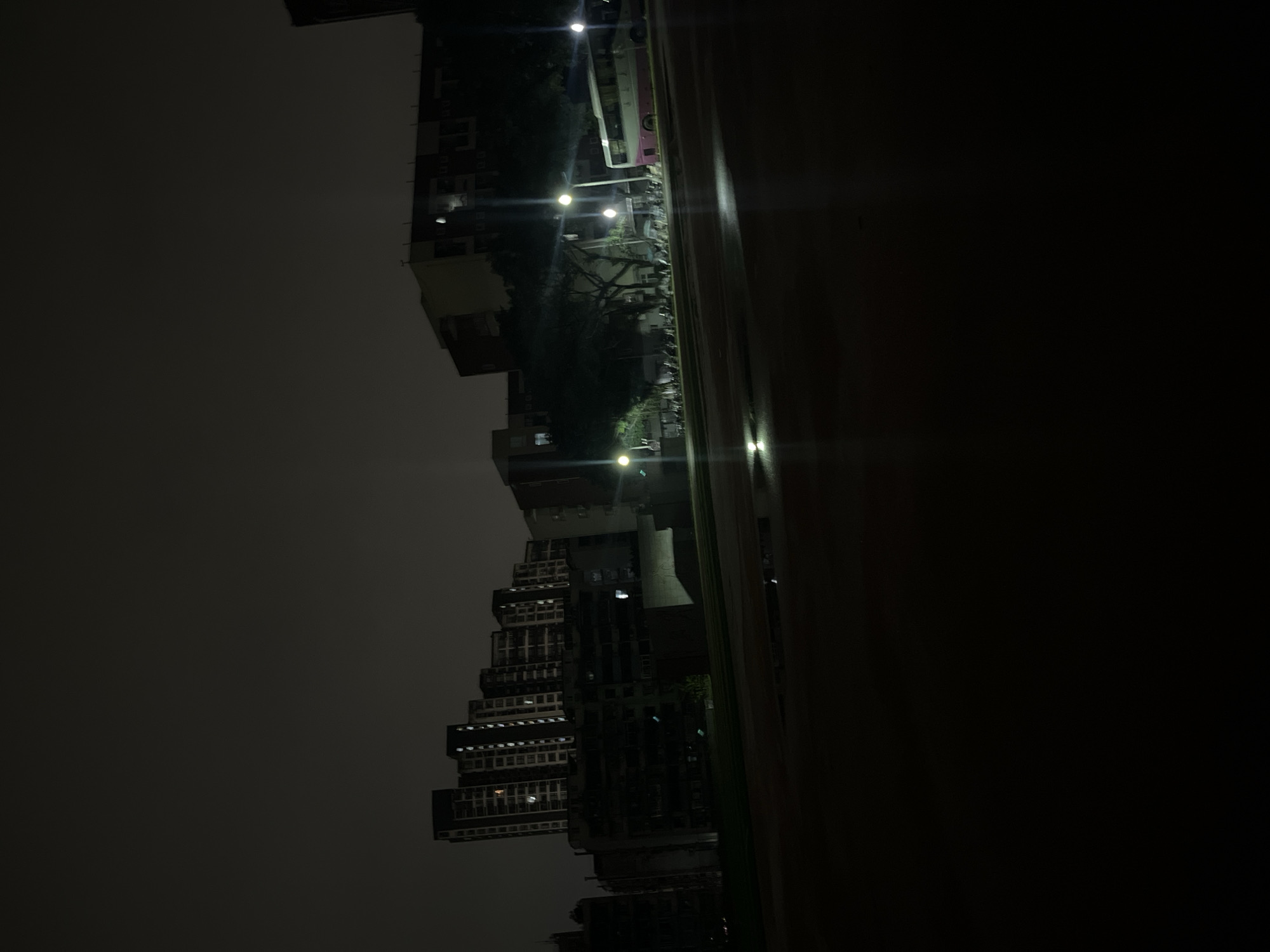 Nighttime urban scenes documented across central Chongqing districts