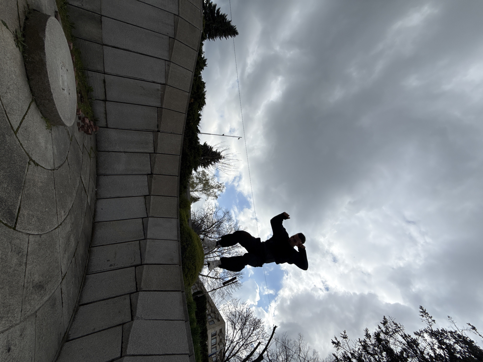Parkour performer executes stunts at Bulgarian monuments, concrete structures