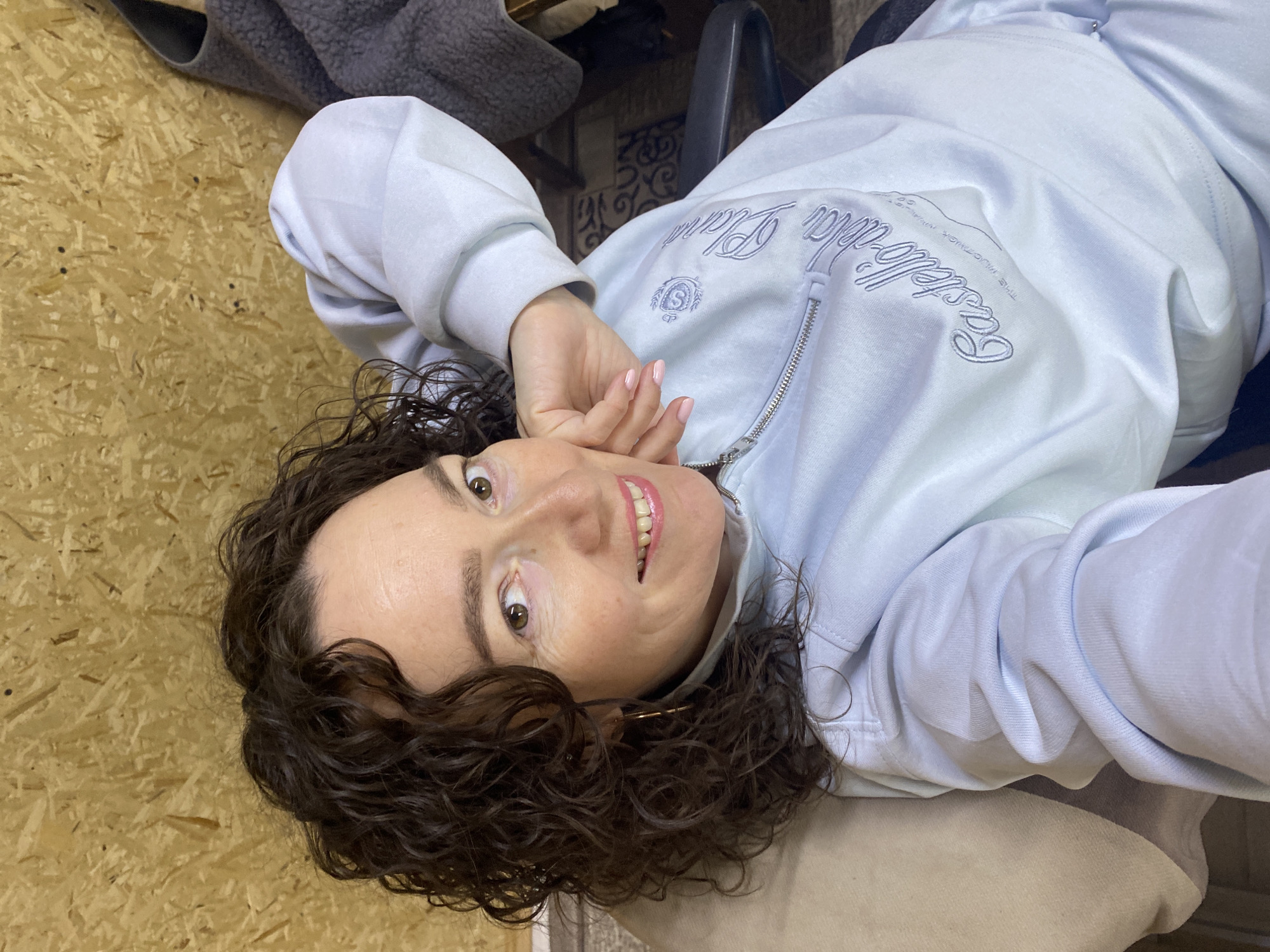 Woman photographed smiling in Ol'khovskoye, Russia early morning