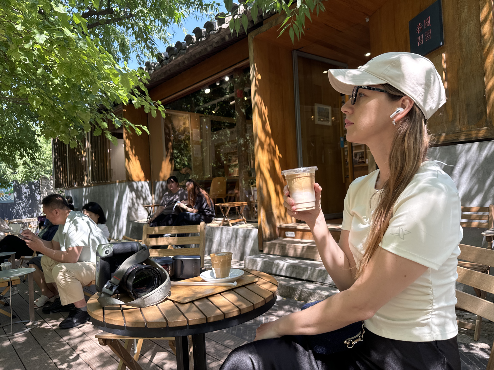 Morning coffee break documented at Beijing outdoor café