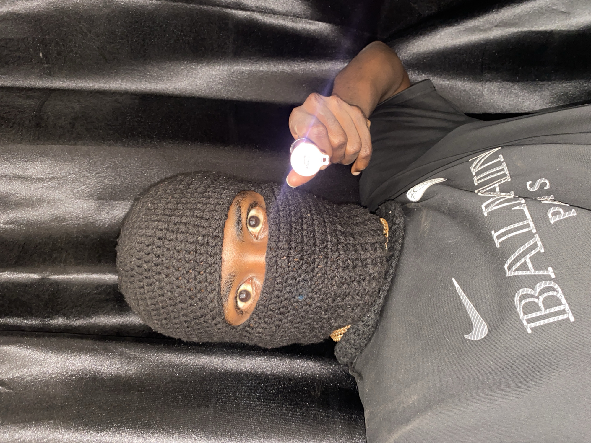 Masked individual photographed repeatedly in Nigeria morning session