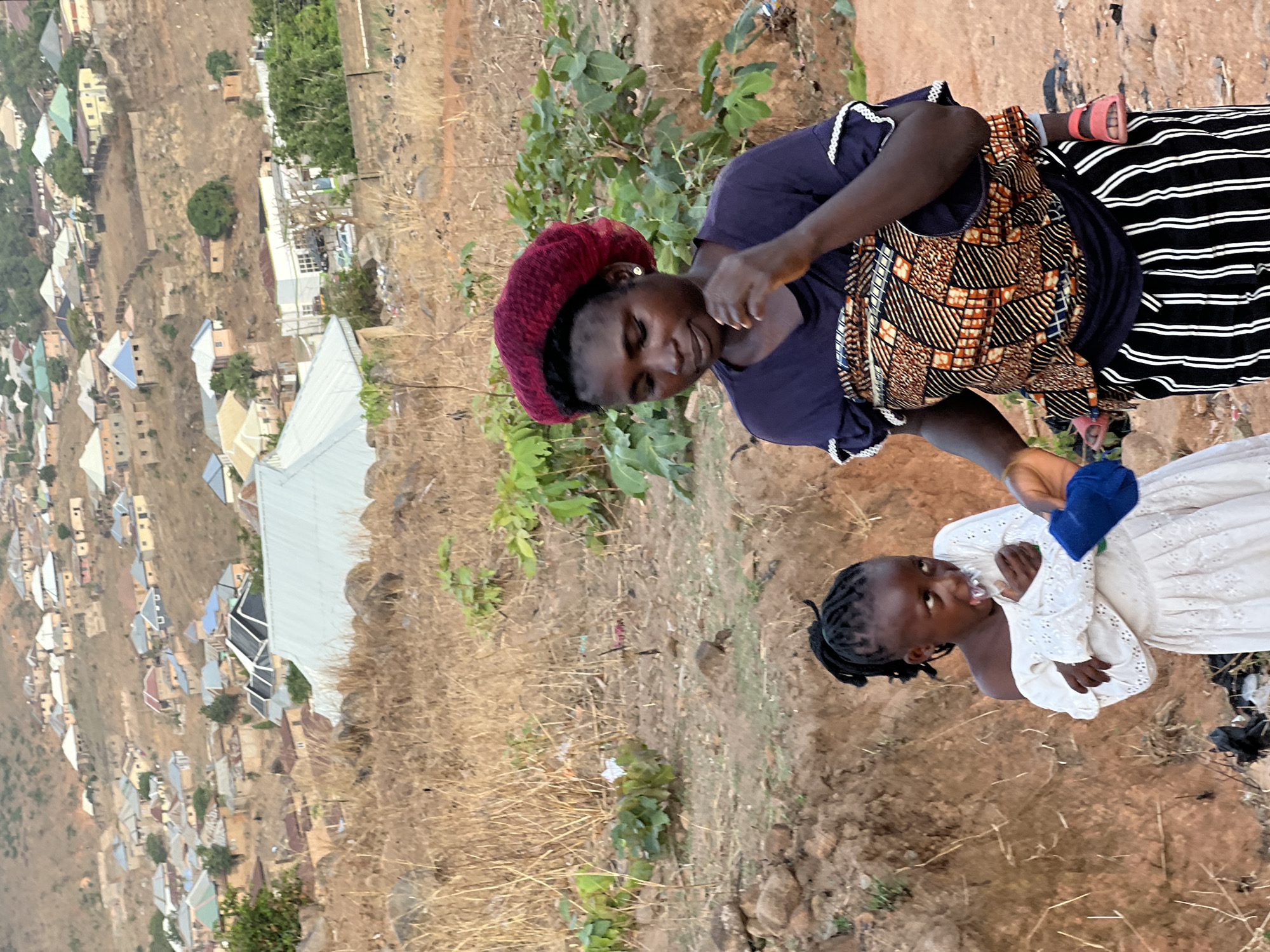 Woman interacts with youth in Jos, Nigeria