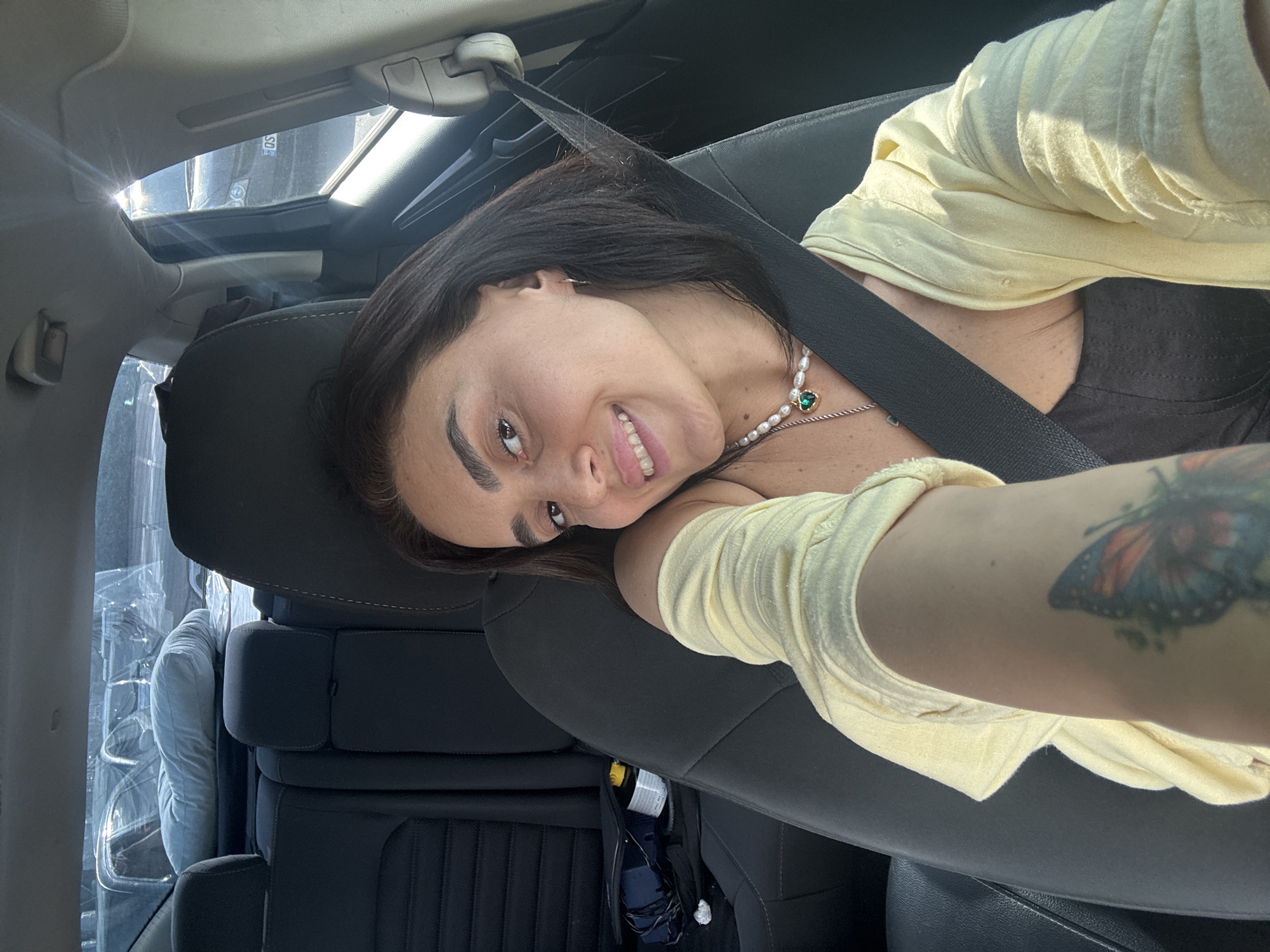 Selfies and street traffic from a car ride through Tbilisi