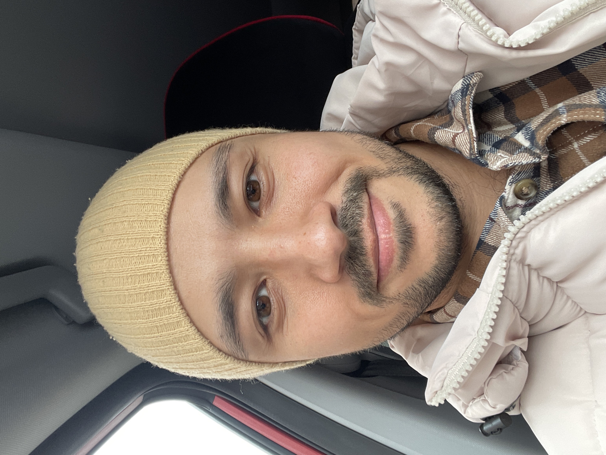 Person in distinctive clothing observed in car interior, Izhevsk