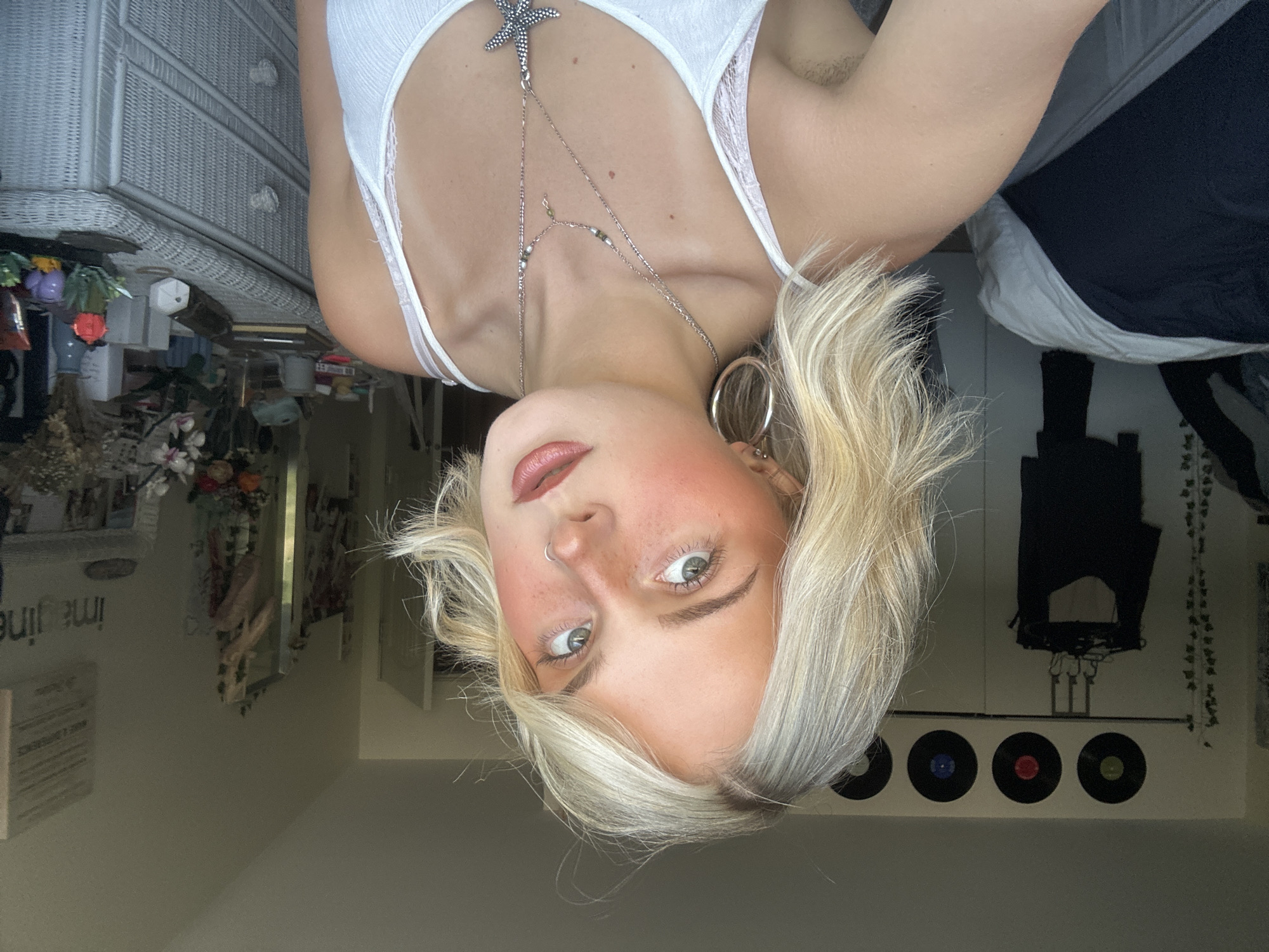 Back-to-back selfies in Whistler, silver jewelry and white tank top