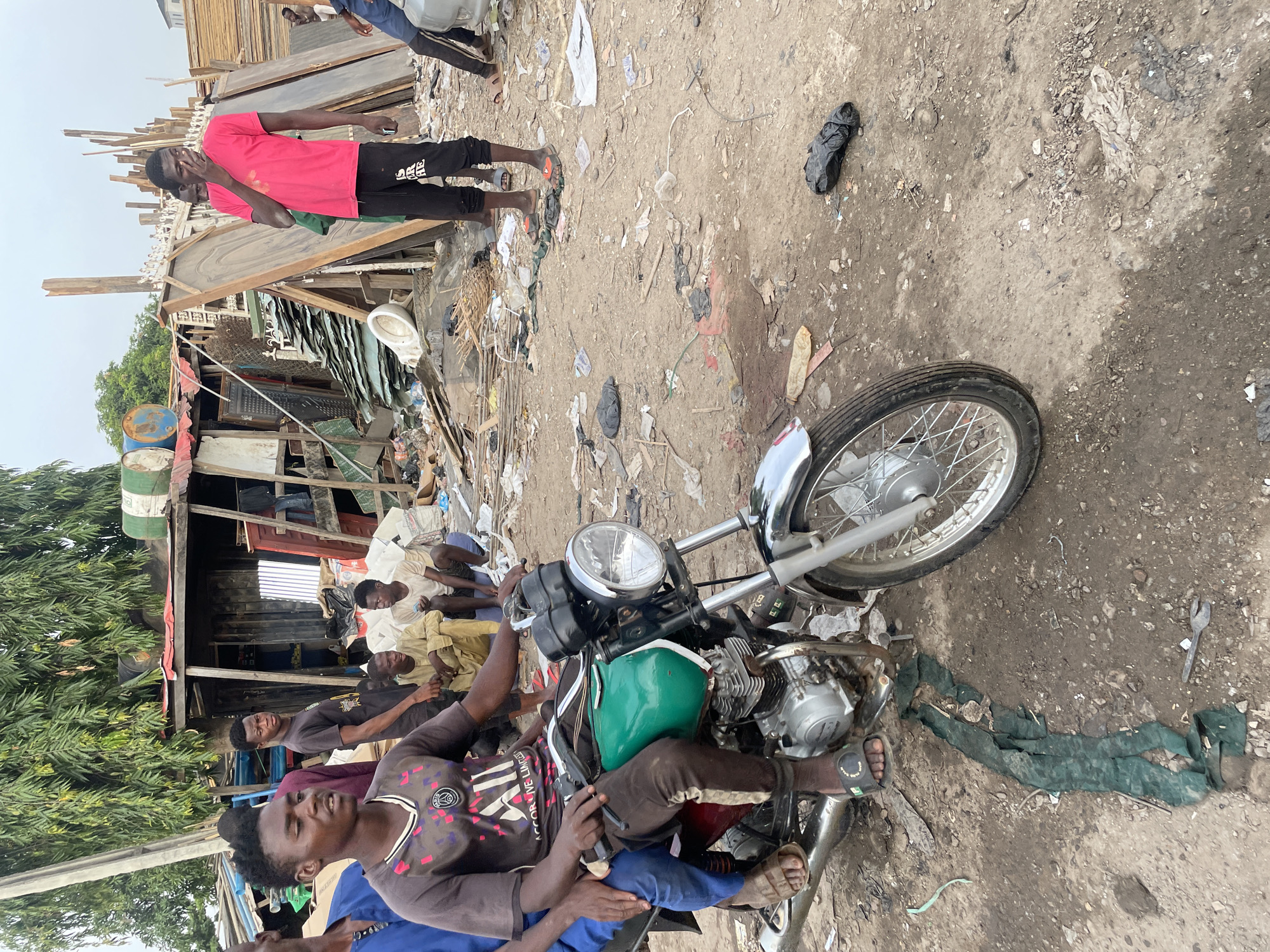 Morning scenes documented in Abuja informal settlement community