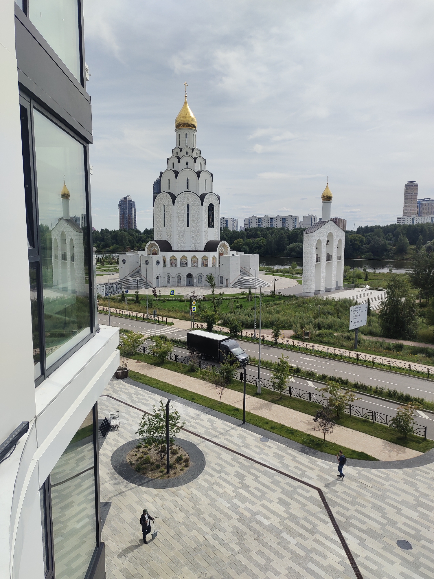 Gold-domed Orthodox church stands in Khimki's urban landscape