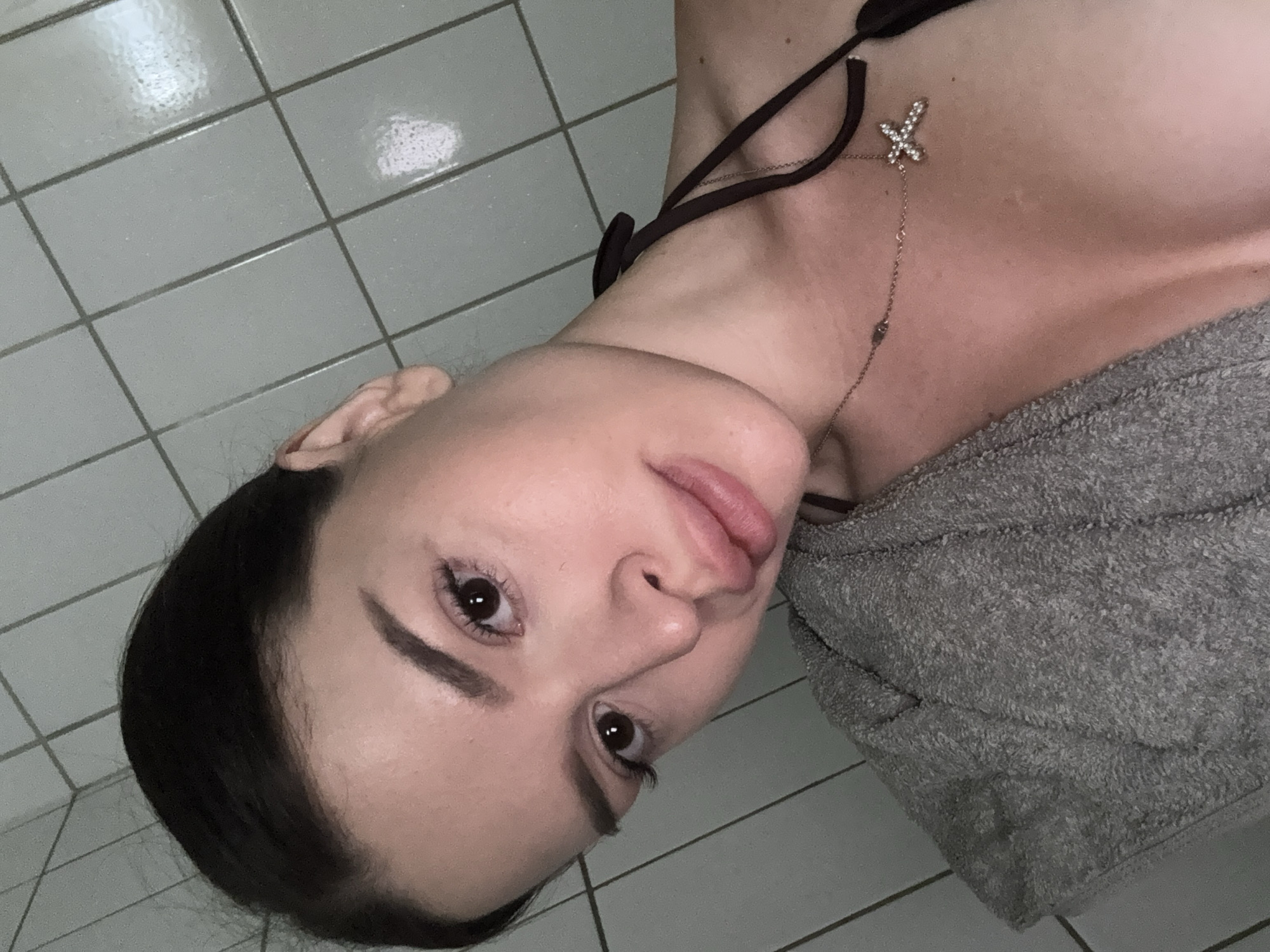 Bathroom selfies in a Prague shower stall, summer 2026.