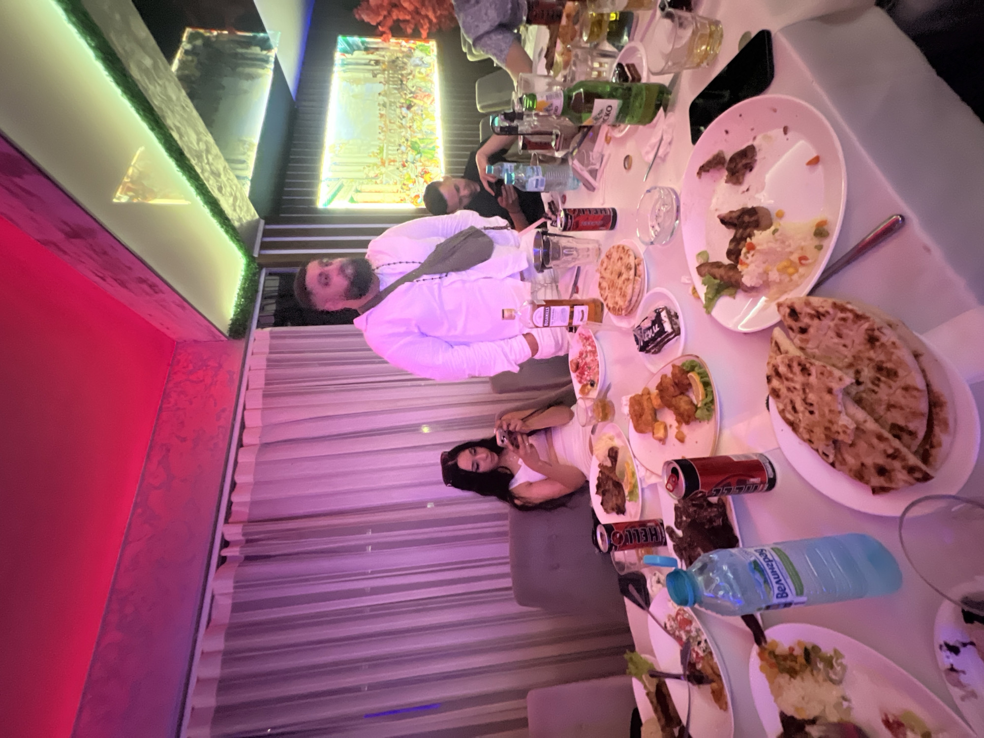Social gathering at illuminated restaurant in Sevlievo, Bulgaria