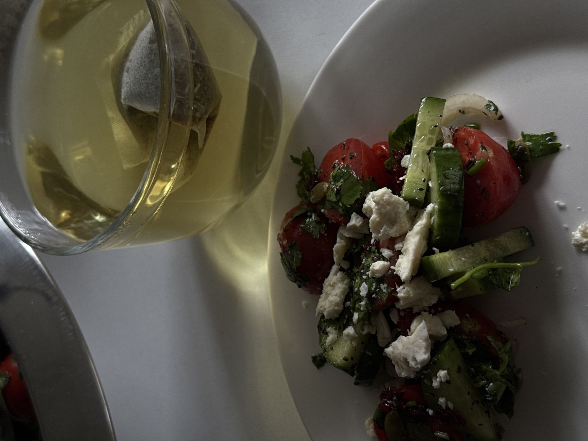Traditional breakfast documented in Yerevan featuring salad and omelet