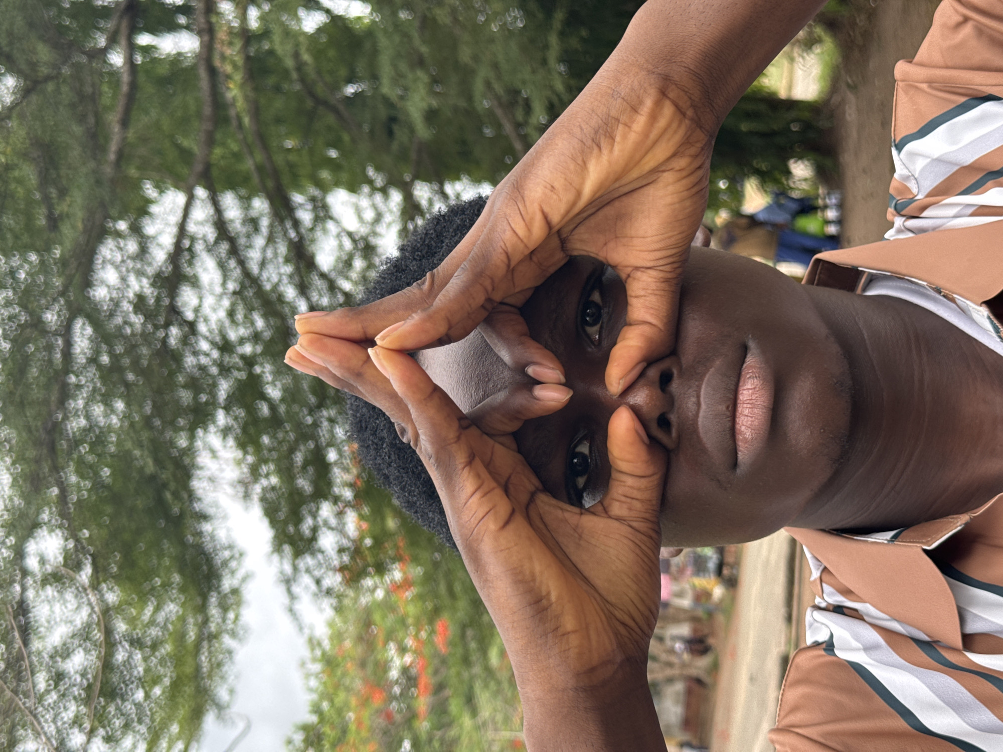 Young men photograph casual moments around Nigerian university campus