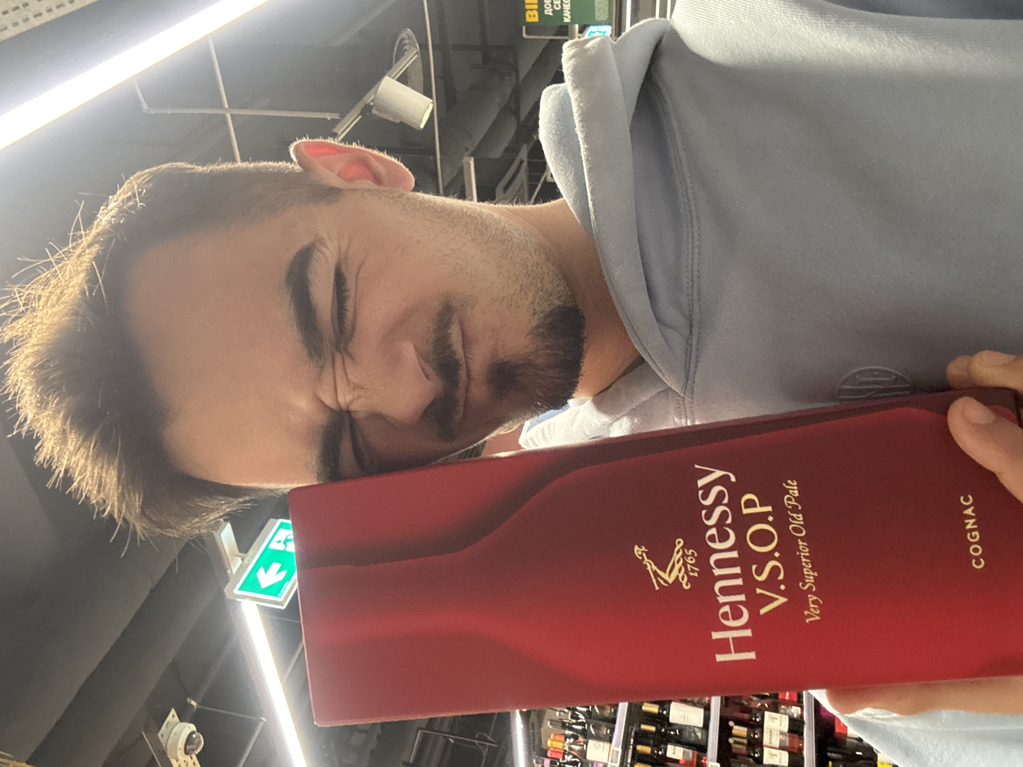 Man with Hennessy cognac box photographed in Sofia
