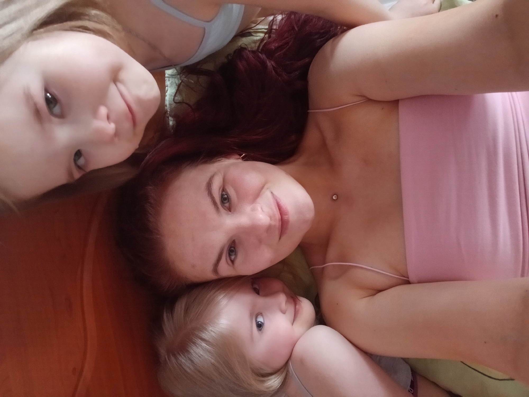 Family photographed in casual domestic moment in Chaikovsky, Russia