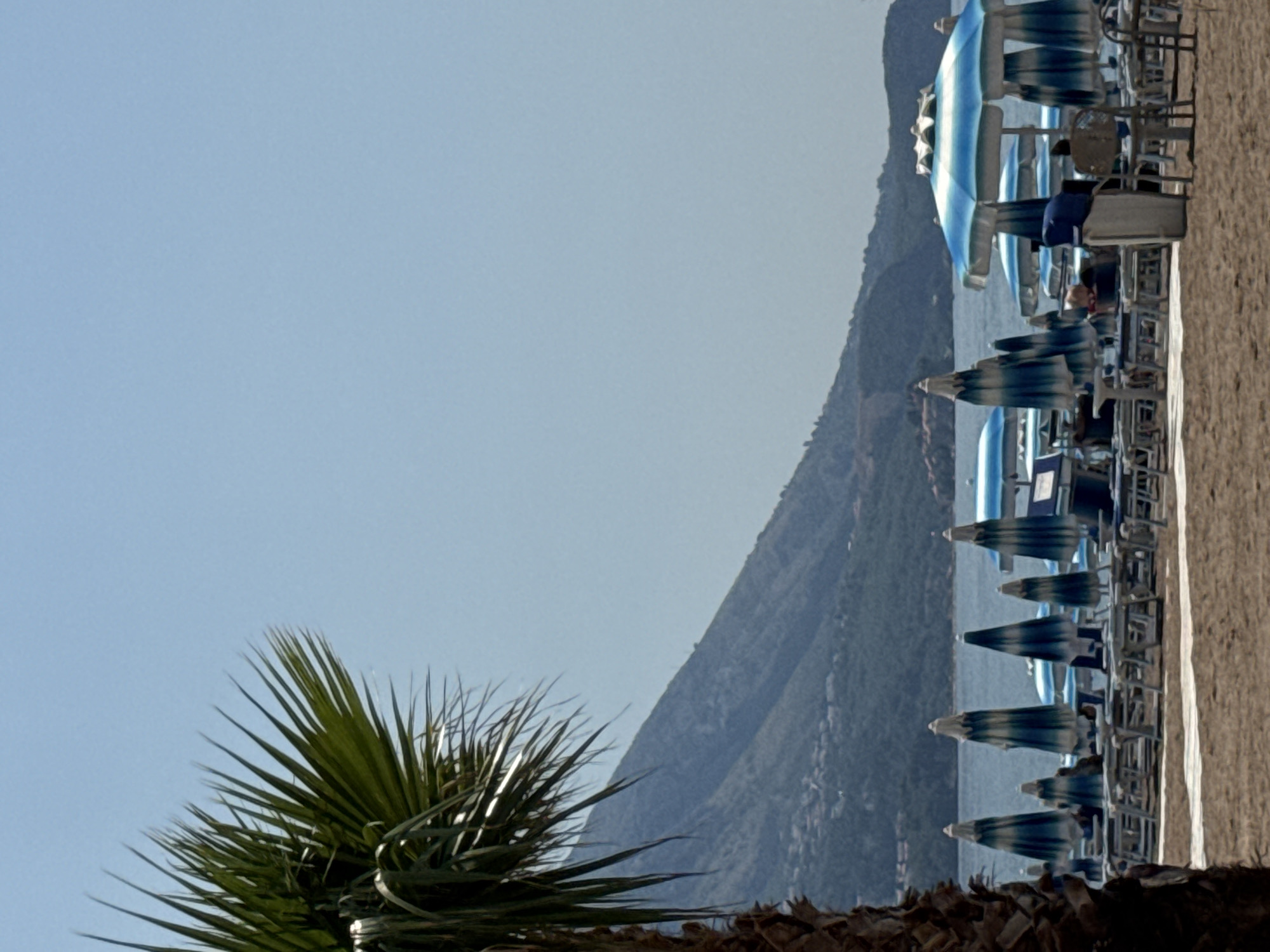 Summer morning along Montenegro's Budva Riviera beach strip