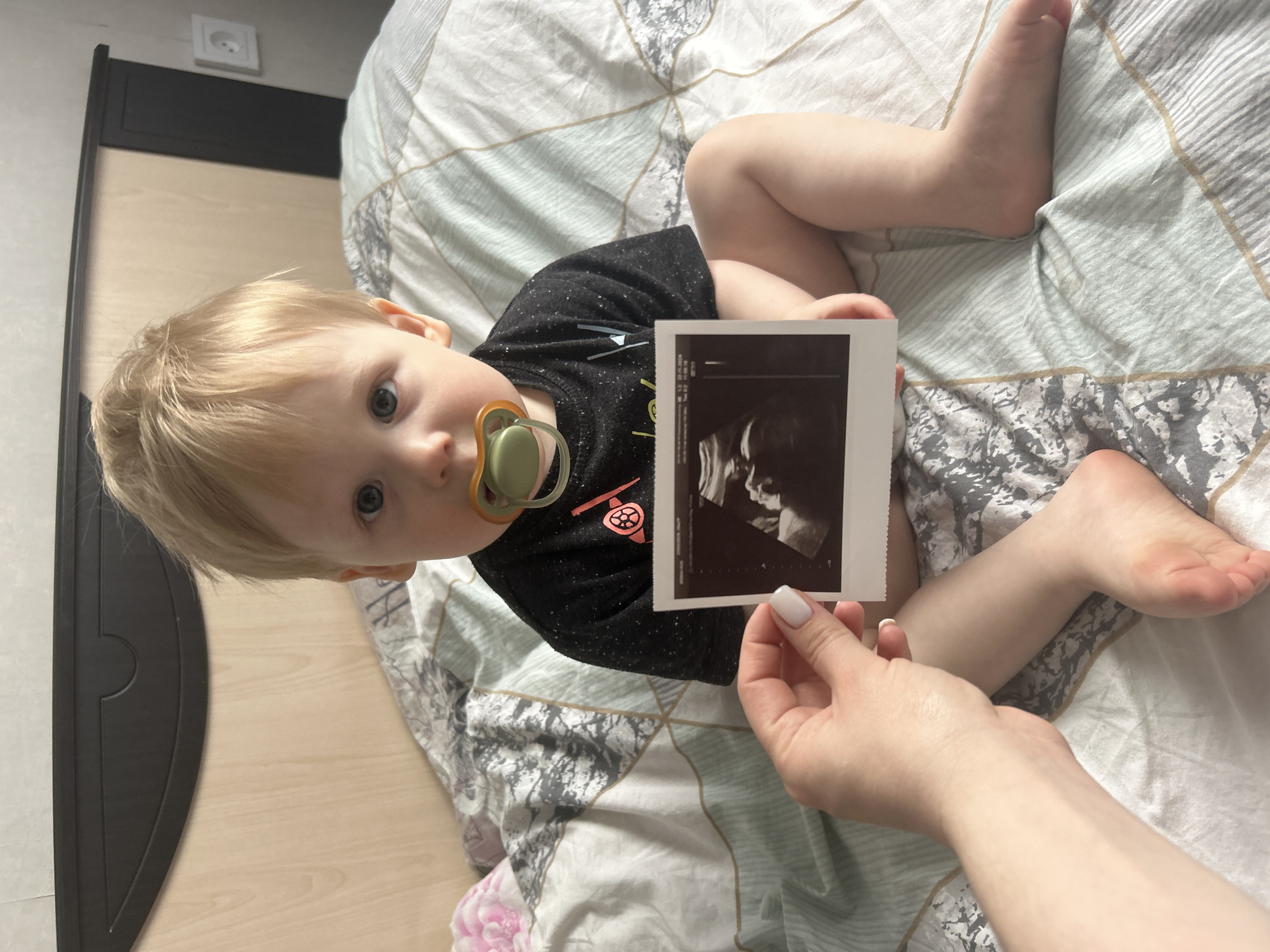 Toddler photo paired with '#Loved ones' text in Chaikovsky