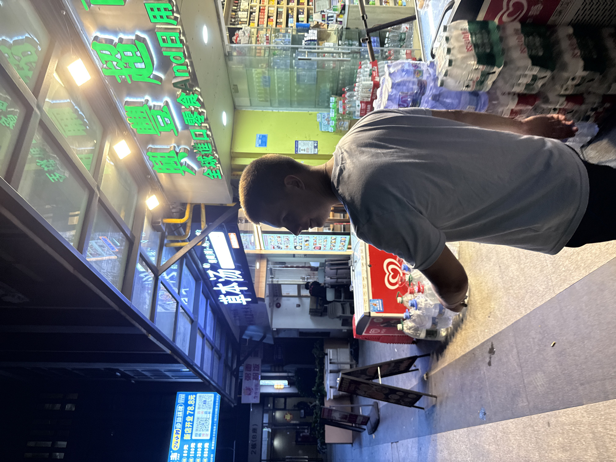 Haizhu District streets lit up at night near Grand Plaza