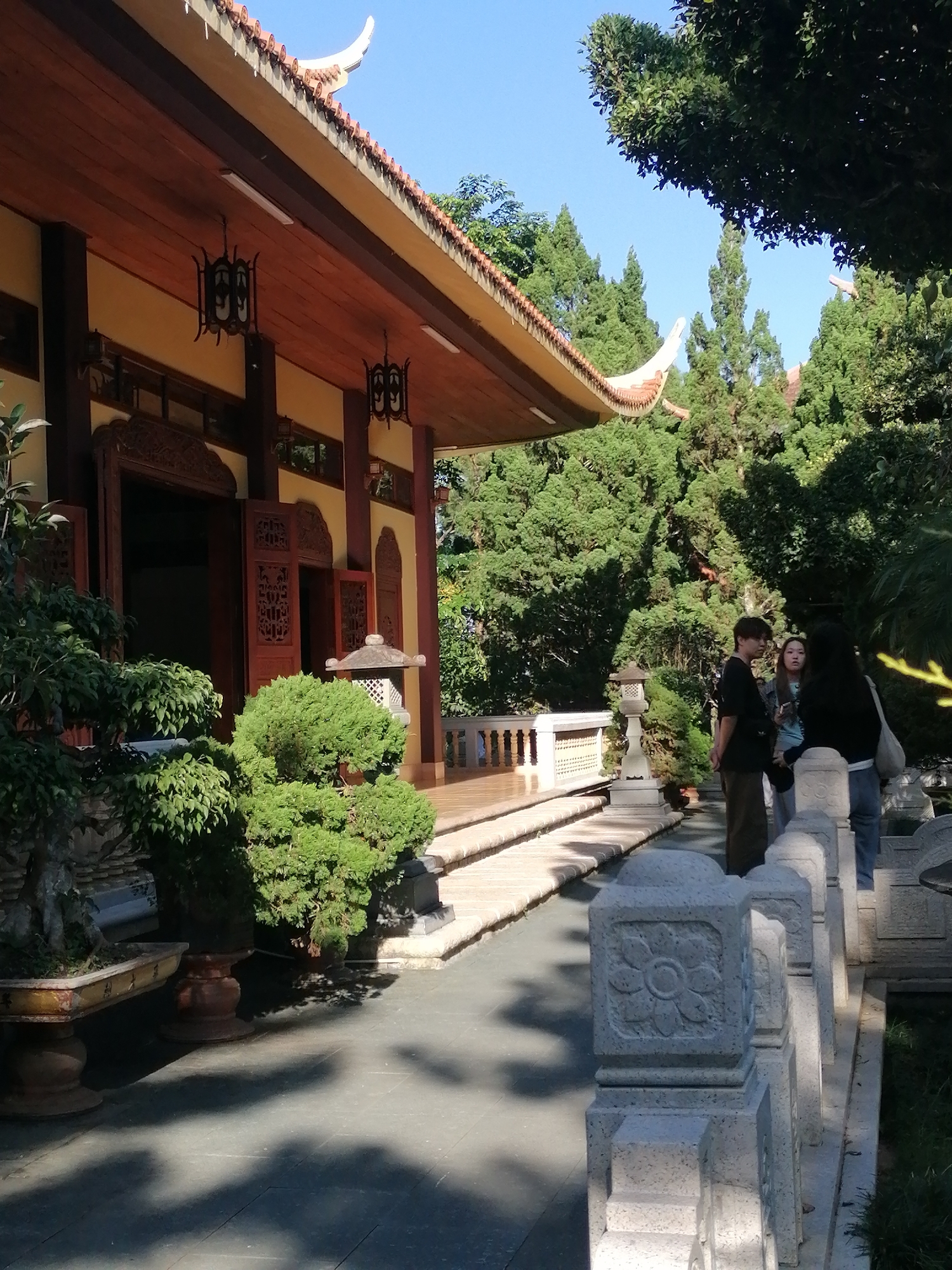 Buddhist temple grounds in Da Lat, with gardens and wildlife