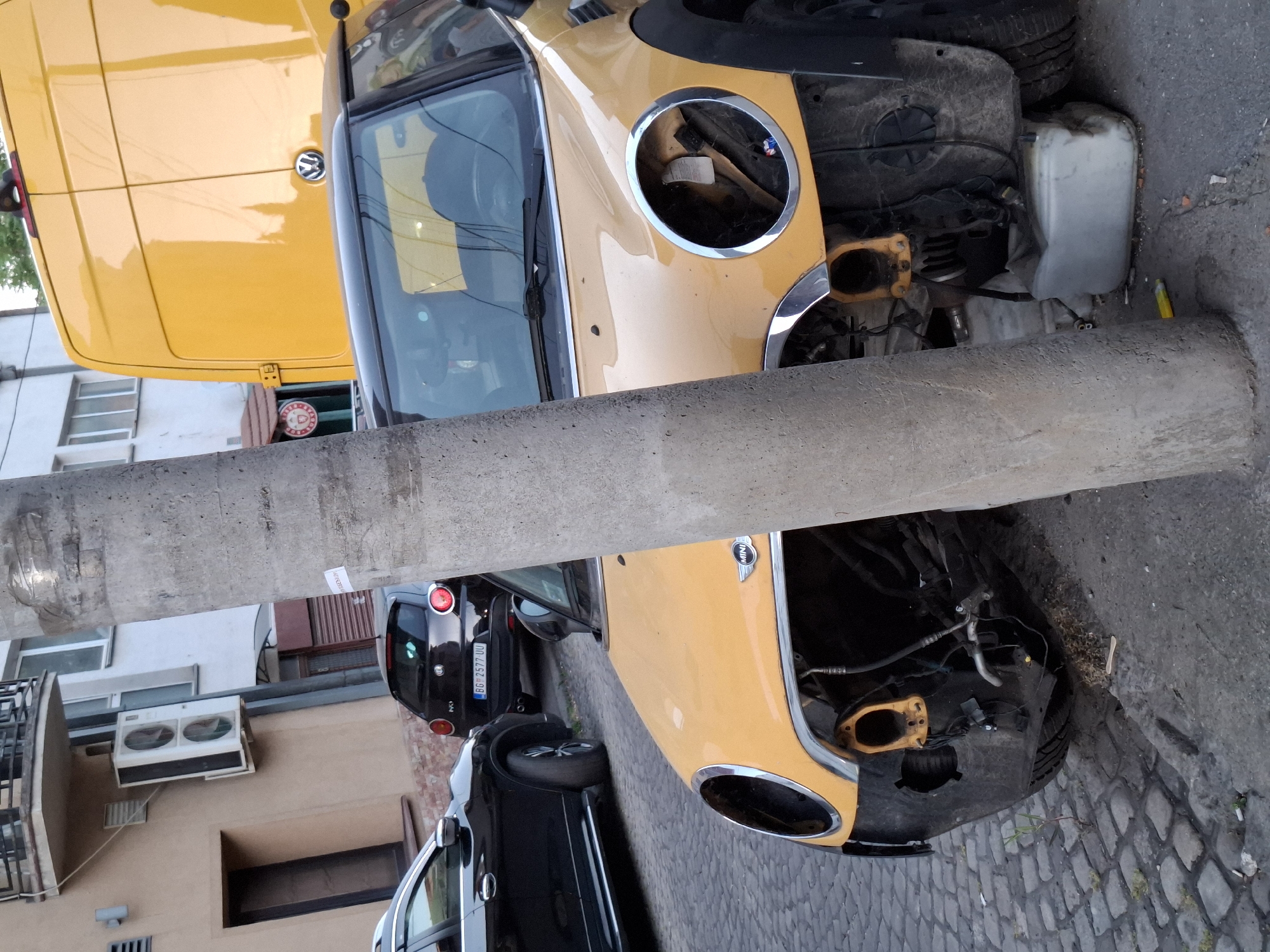 Yellow Mini Cooper severely damaged in Zemun street accident