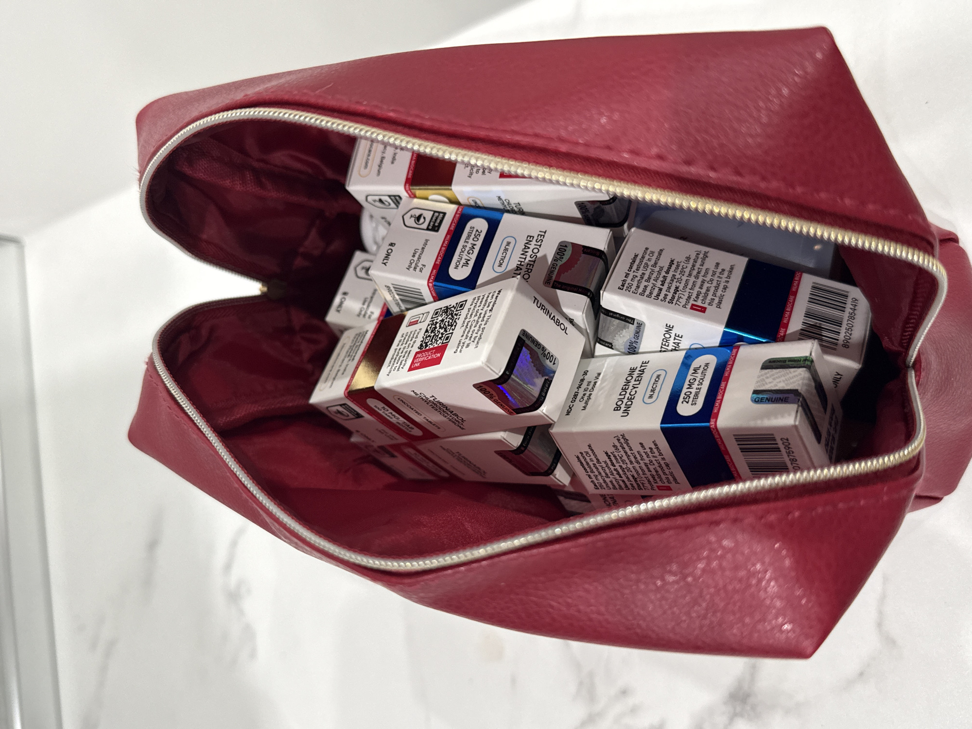 Red bag filled with packaged boxes documented in Burgas
