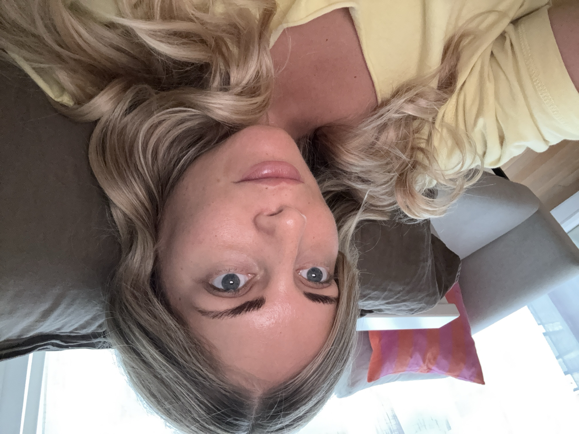 Woman resting on Paris sofa captured in afternoon photos