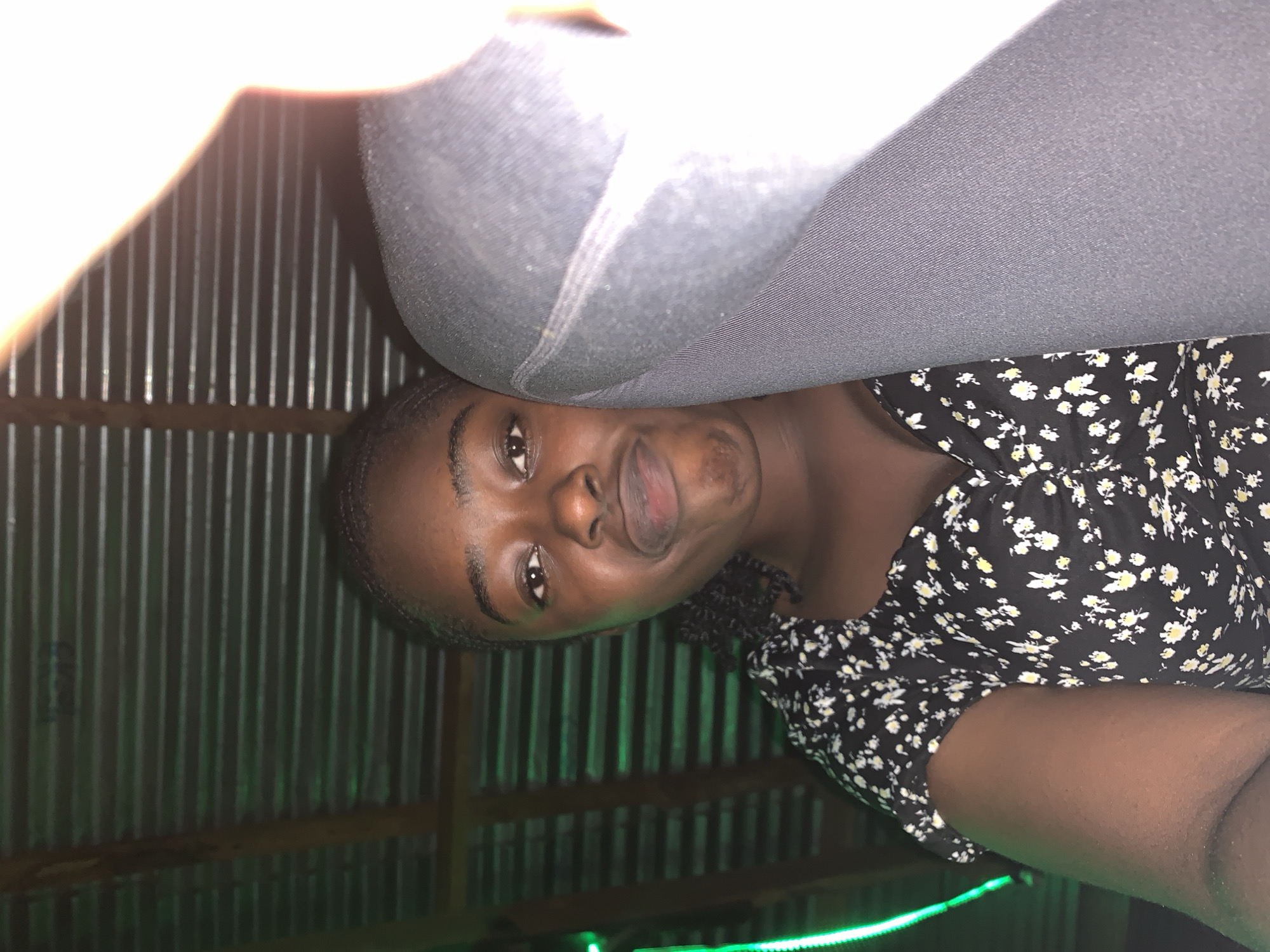 Green-lit nighttime social gathering documented at Nigeria stadium venue
