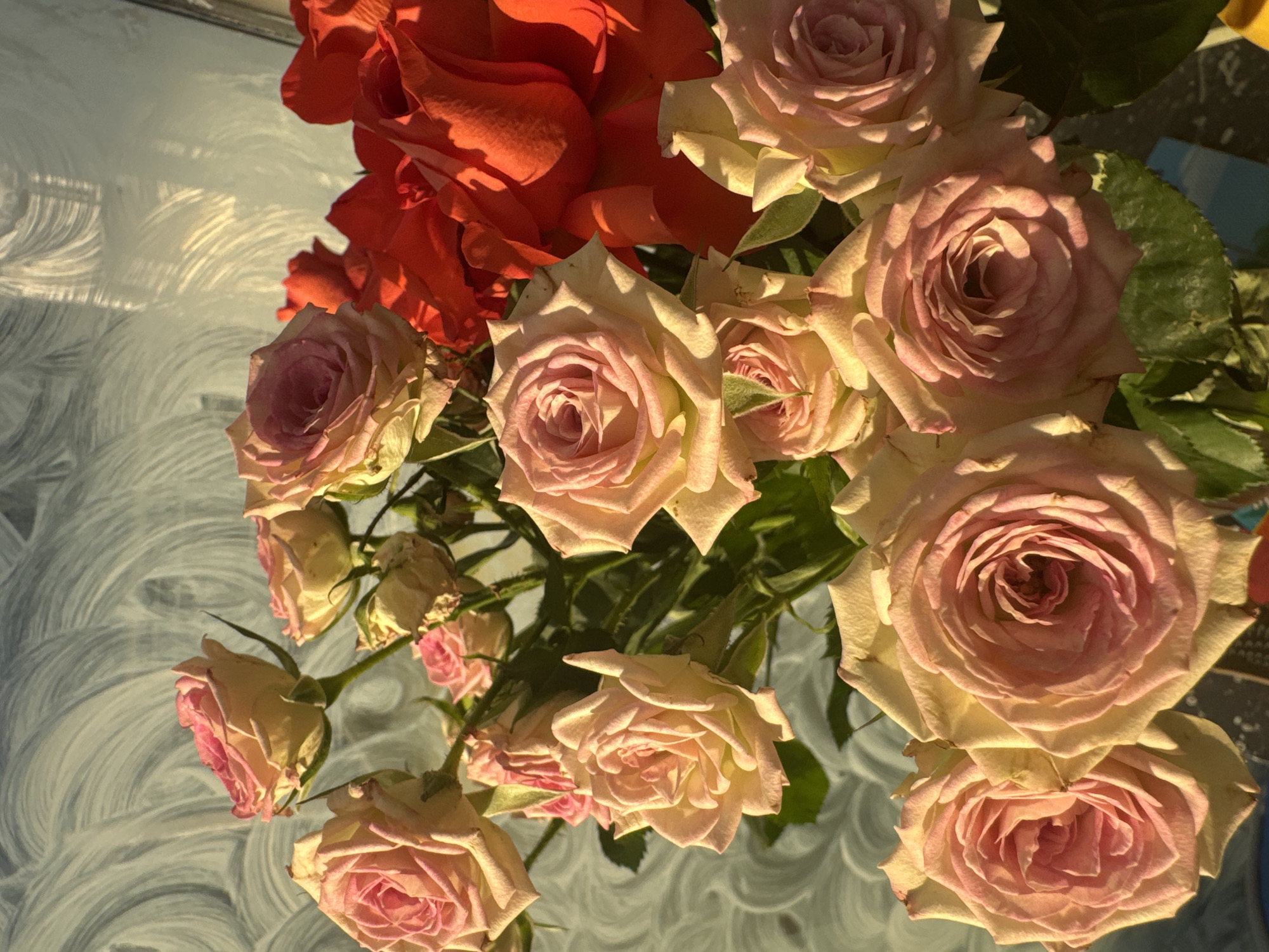 Colorful rose bouquet arranged on table in French town