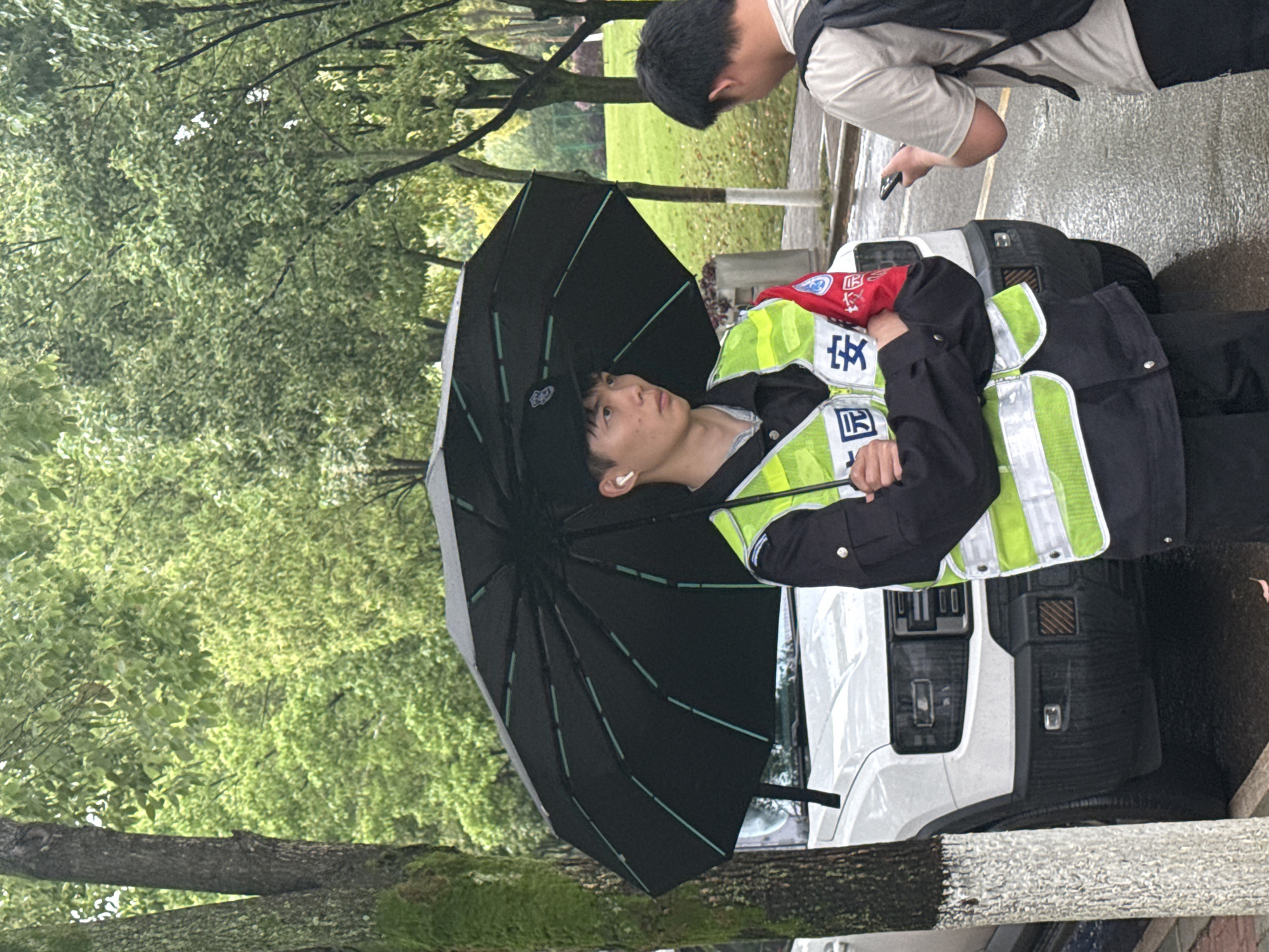 Security guard stationed at building in early morning Jiangjin