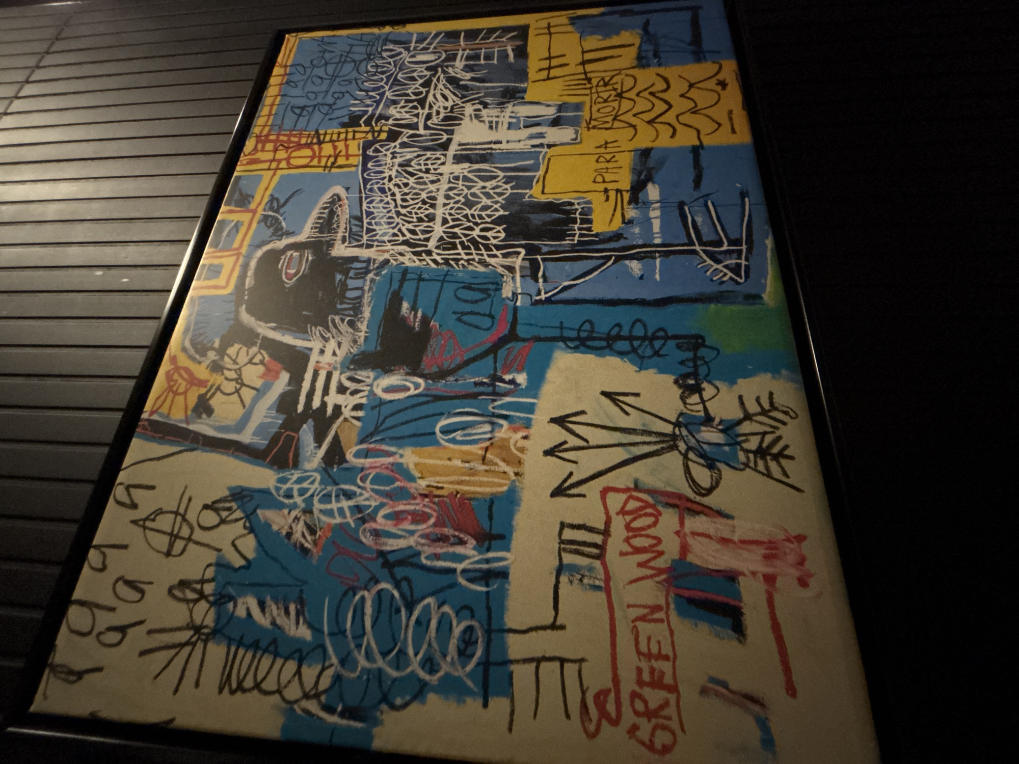 Basquiat-style painting with mixed text observed in Puebla interior
