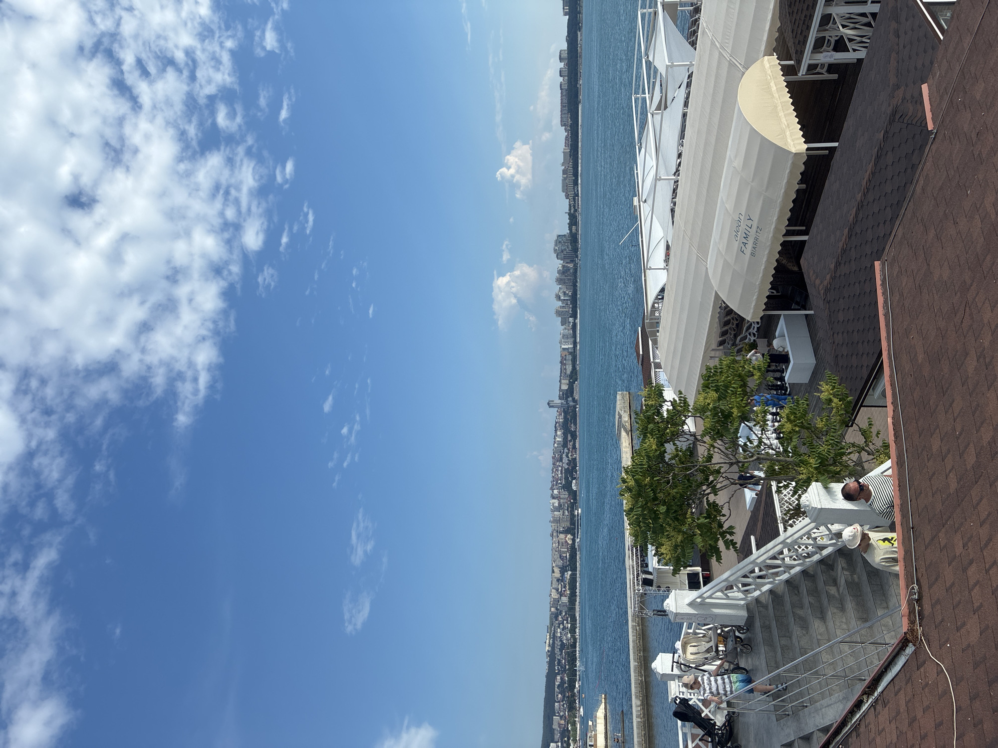 Tourist explores Gelendzhik waterfront attractions and dining over afternoon
