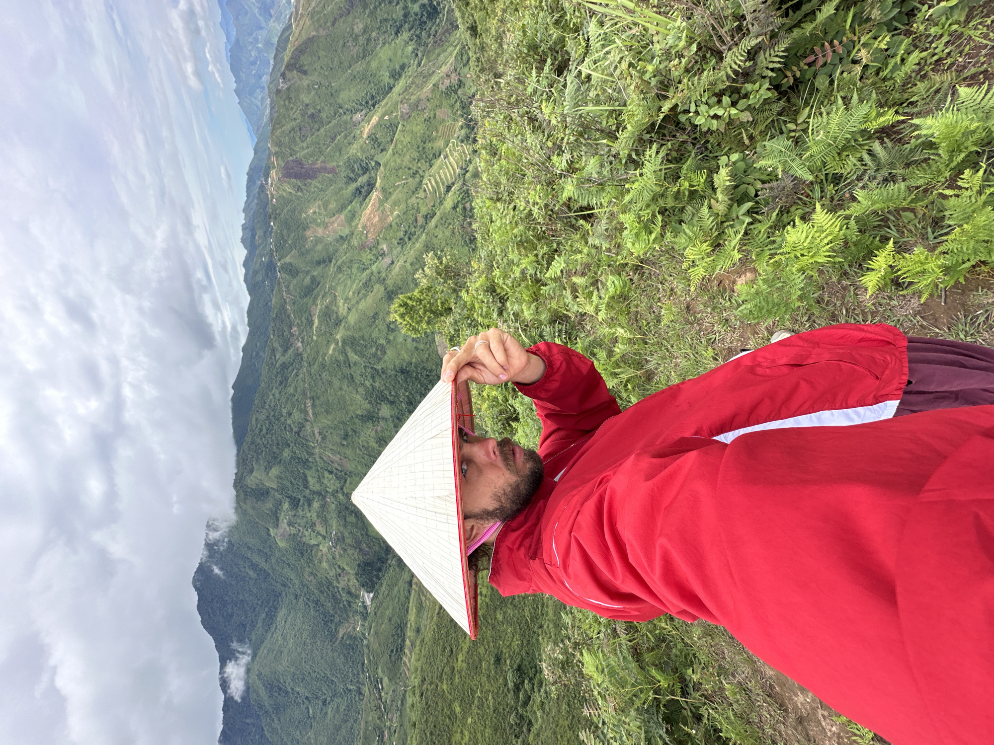Tourist poses for photos at Vietnam's Tà Xùa terraces